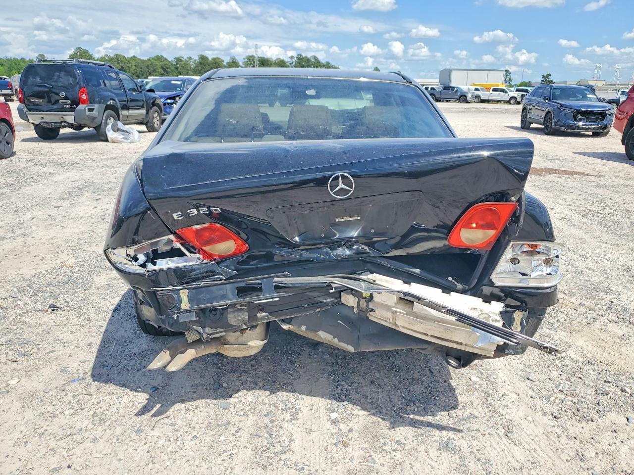 1999 Mercedes-benz E 320 Black vin: WDBJF65H4XA896858