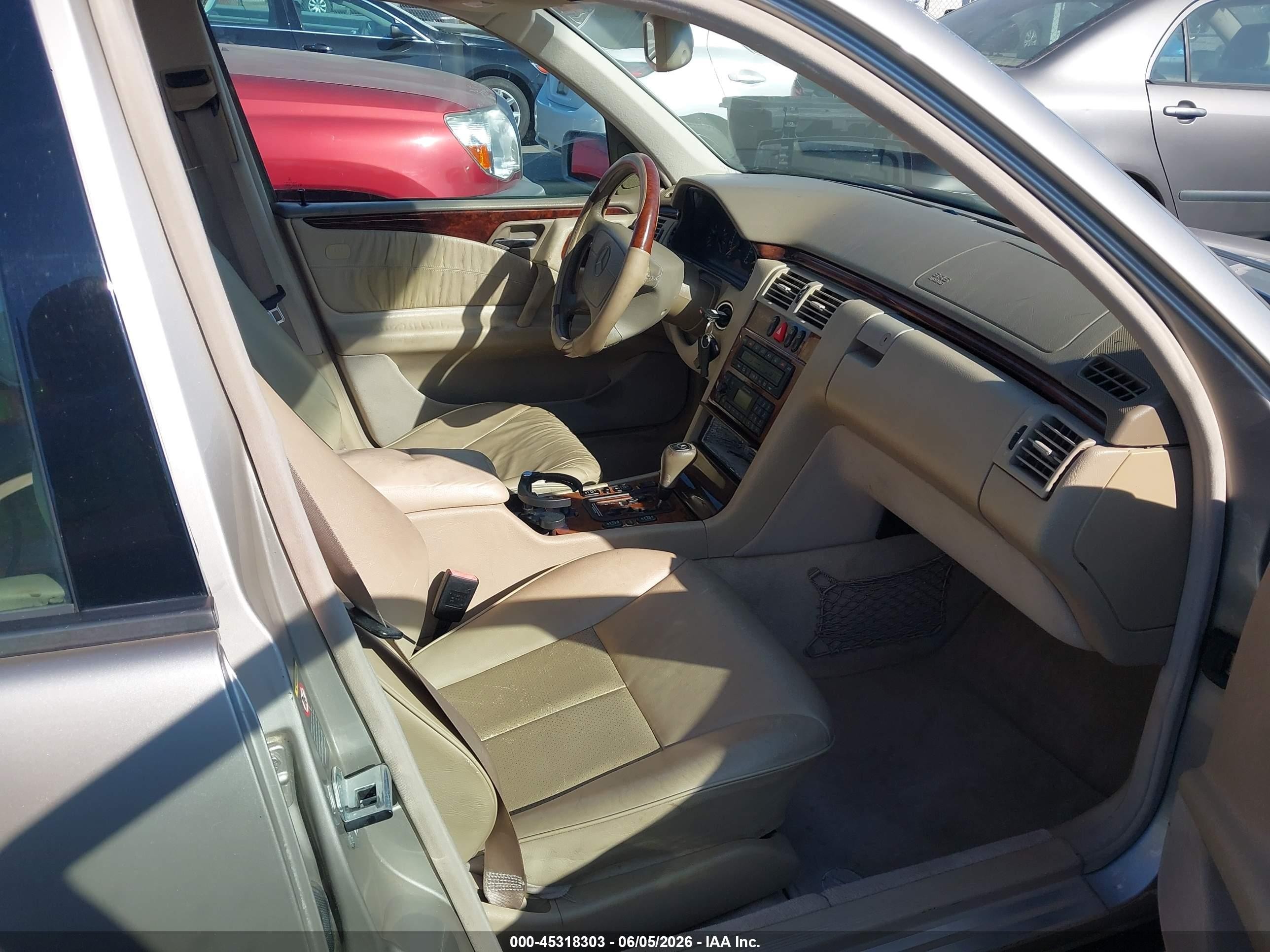 1999 Mercedes-benz E 320   Dark Brown vin: WDBJF65H8XA773001