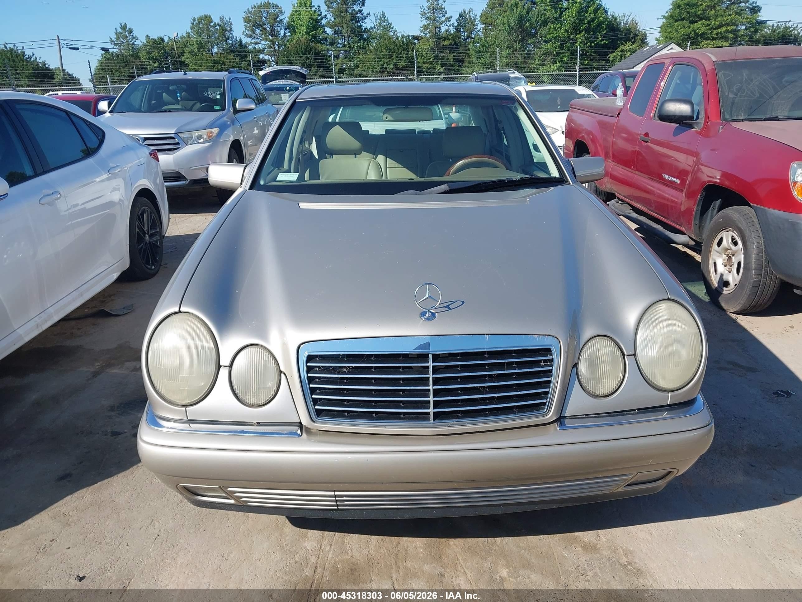 1999 Mercedes-benz E 320   Dark Brown vin: WDBJF65H8XA773001