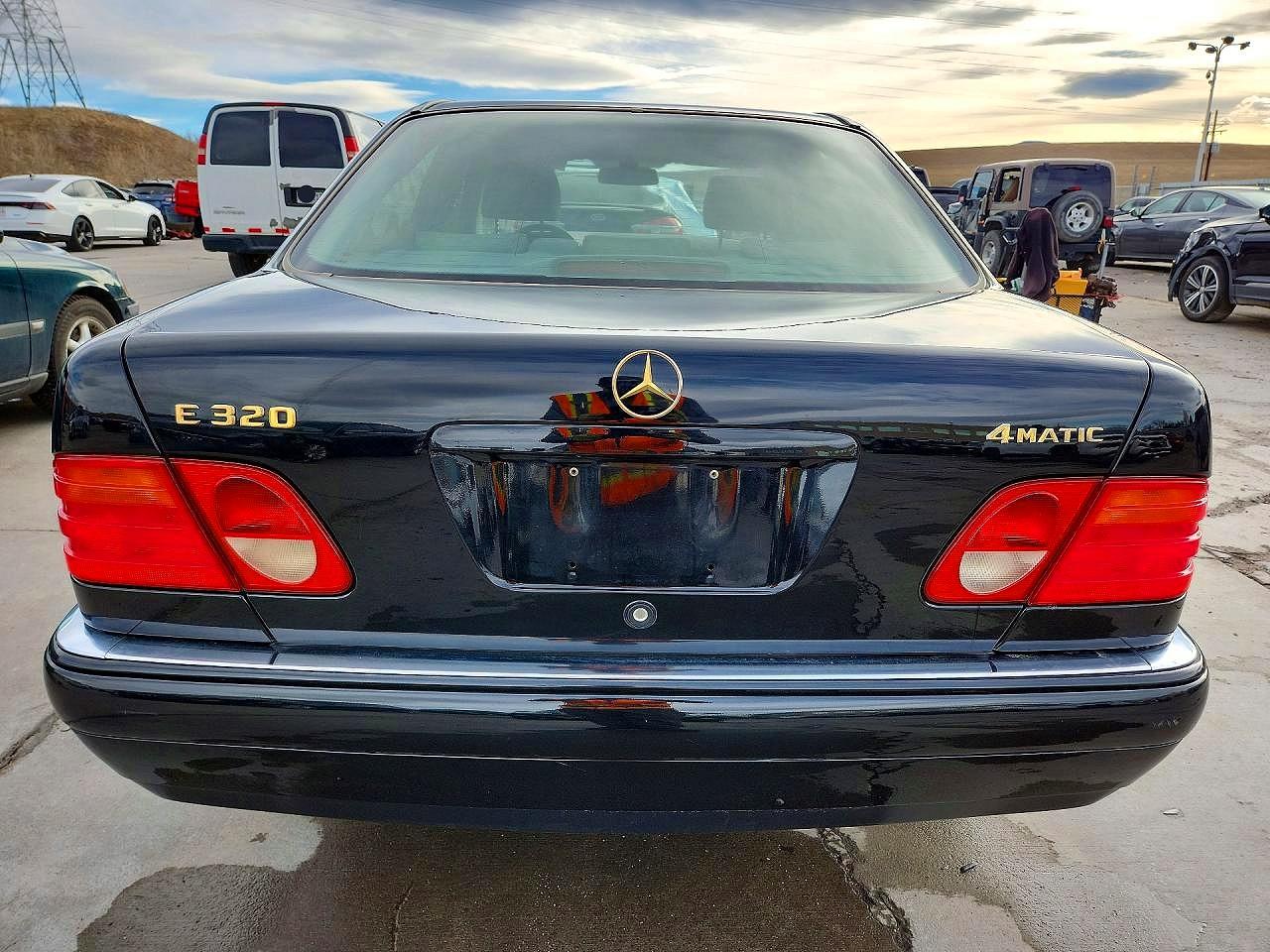 1999 Mercedes-benz E 320 4matic Black vin: WDBJF82H3XX019971