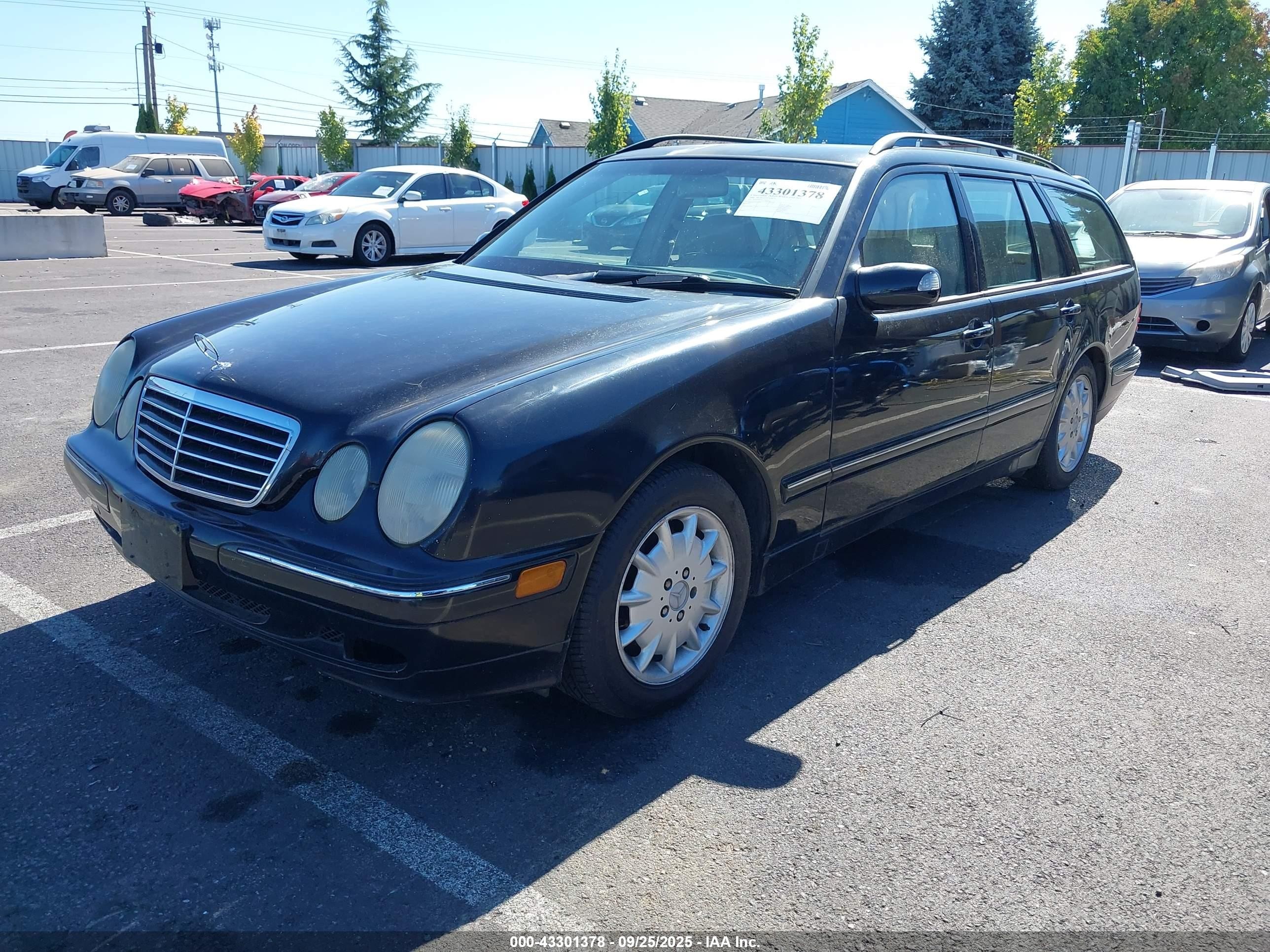 2000 Mercedes-benz E 320   Black vin: WDBJH65J4YA999521