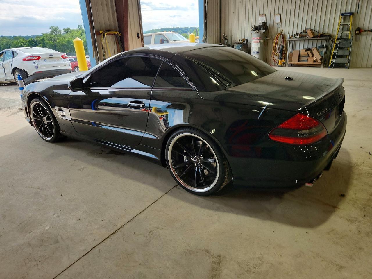 2009 Mercedes-benz Sl 63 Amg Black vin: WDBSK70FX9F146253