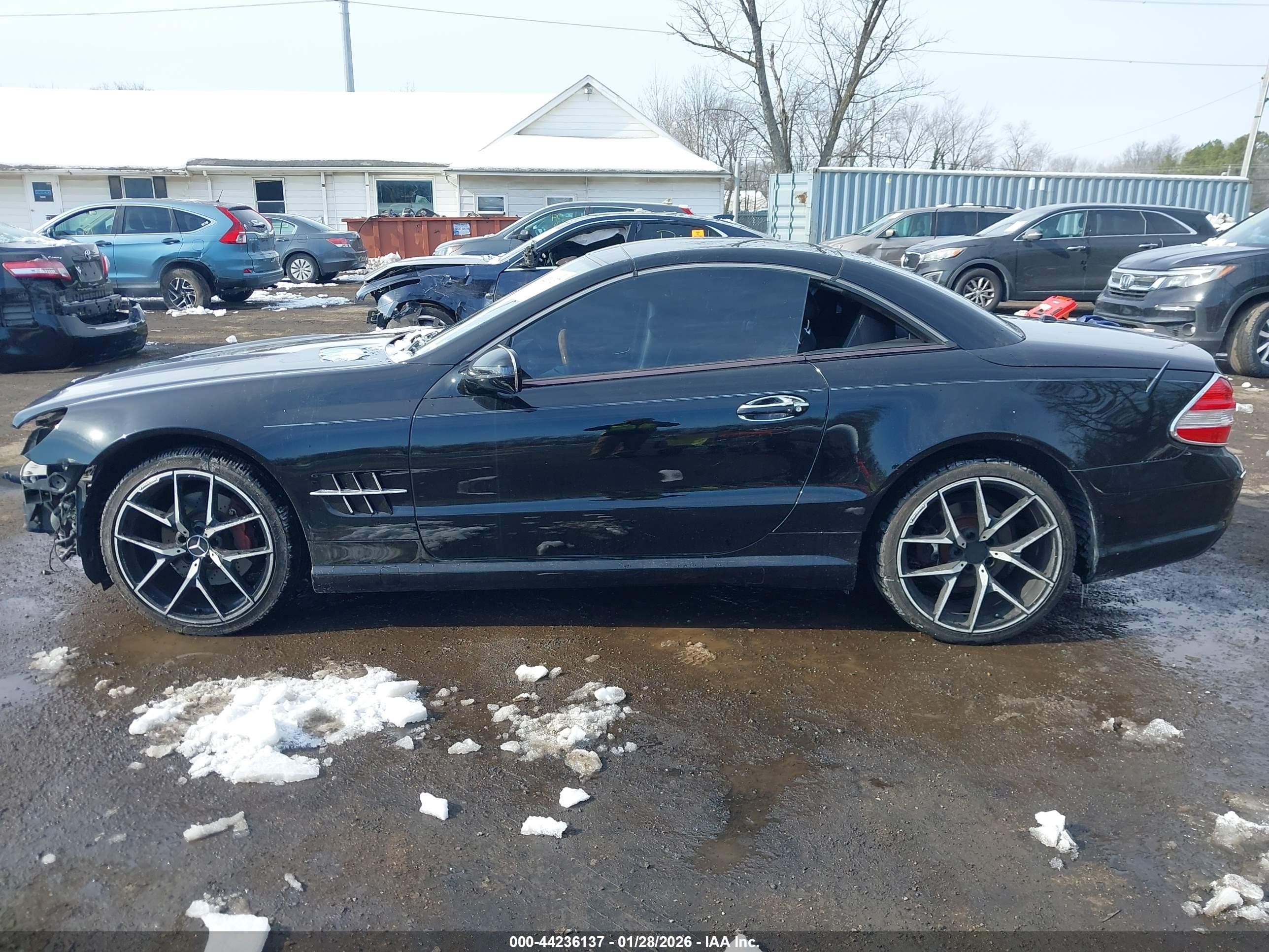 2009 Mercedes-benz Sl 550   Черный vin: WDBSK71F49F151138