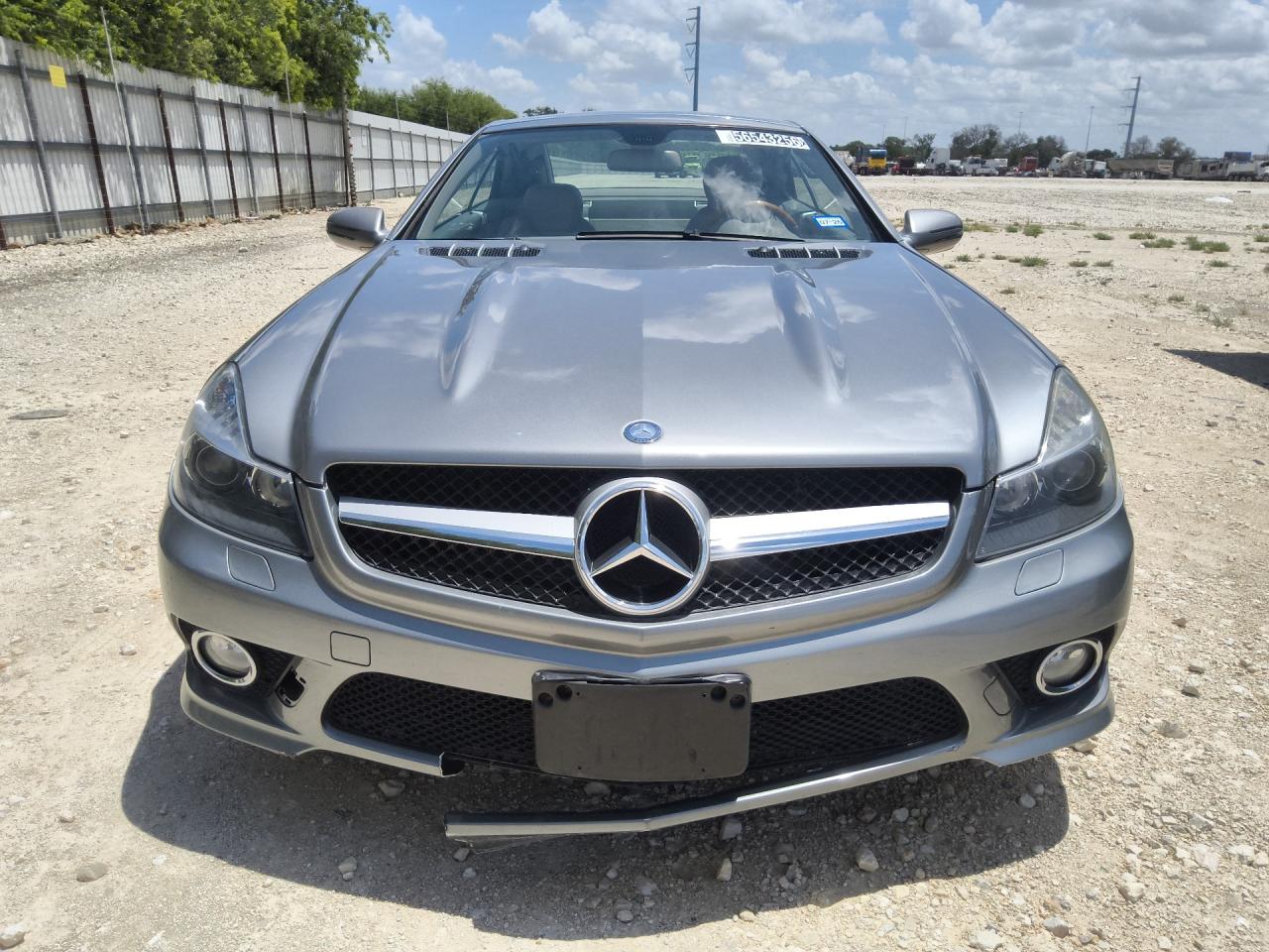 2009 Mercedes-benz Sl 550 Silver vin: WDBSK71FX9F155727 Damage: Grille Molding, Broken, Replacement Required