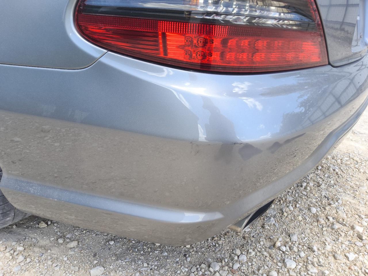 2009 Mercedes-benz Sl 550 Silver vin: WDBSK71FX9F155727 Damage: Rear Bumper/Cover, Scraped, 3 To 4 Inches