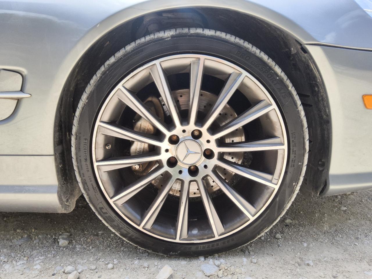 2009 Mercedes-benz Sl 550 Silver vin: WDBSK71FX9F155727 Damage: Right Front Wheel, Curb Rash, 3 To 4 Inches