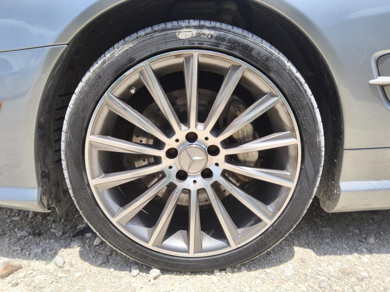 2009 Mercedes-benz Sl 550 Silver vin: WDBSK71FX9F155727 Damage: Left Front Wheel, Curb Rash, 2 To 3 Inches