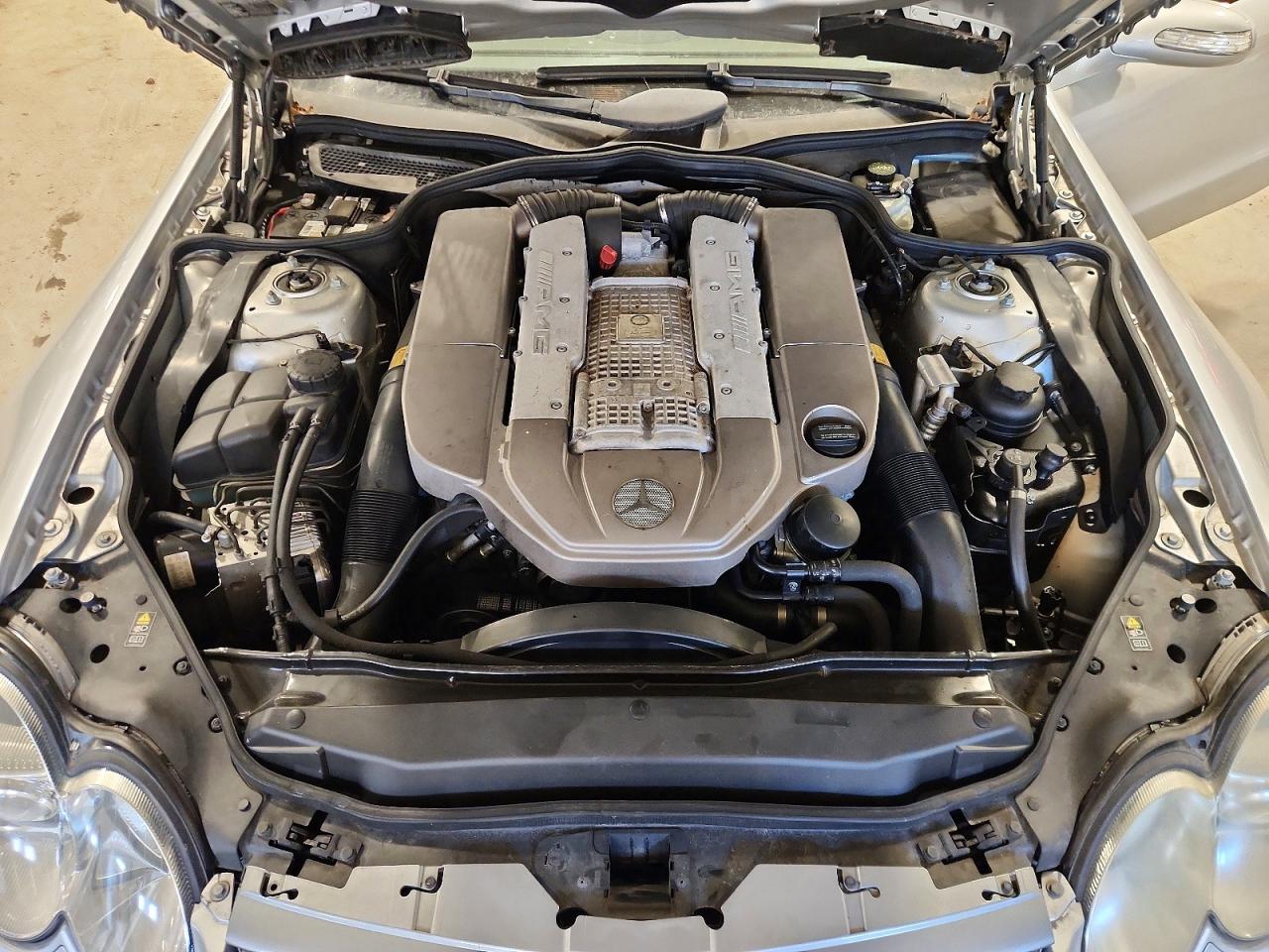 2004 Mercedes-benz Sl 55 Amg Серебряный vin: WDBSK74F74F073166