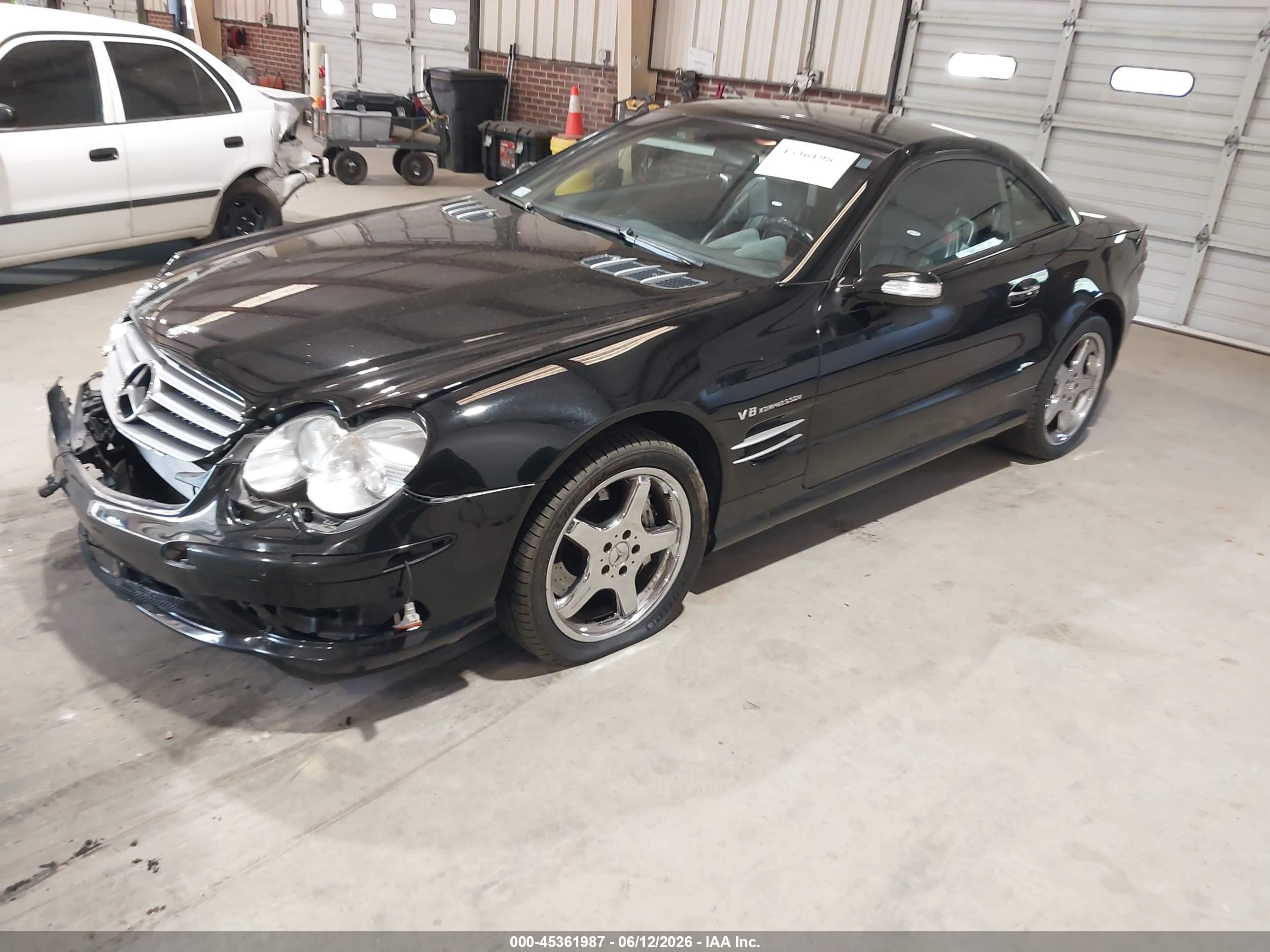 2004 Mercedes-benz Sl 55 Amg   Черный vin: WDBSK74F84F076903