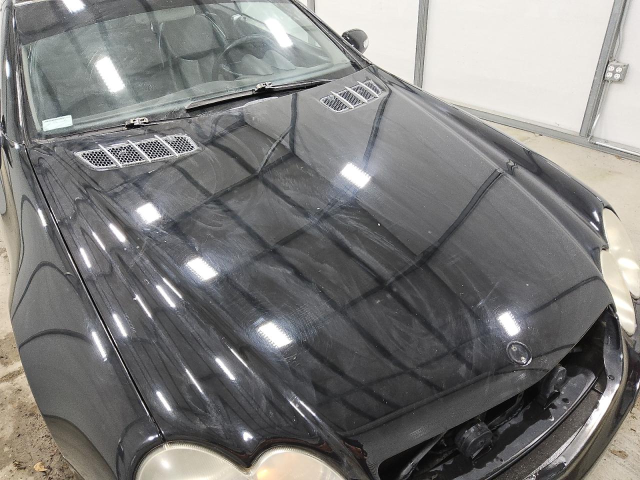 2003 Mercedes-benz Sl 500r Black vin: WDBSK75F03F007670 Damage: Hood, Dent(S) W/ Paint Dmg, 1 To 2 Inches