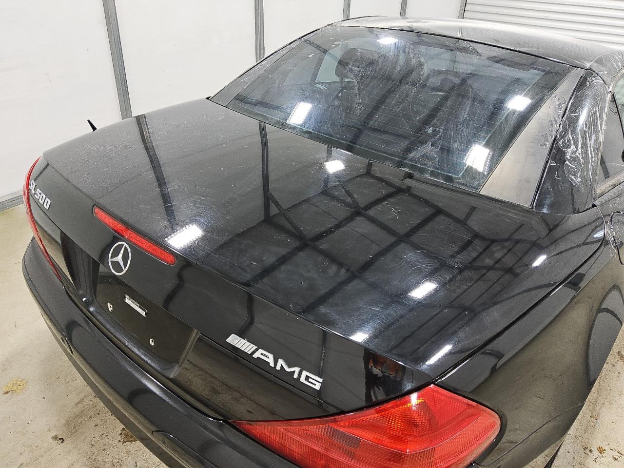 2003 Mercedes-benz Sl 500r Black vin: WDBSK75F03F007670 Damage: Deck Lid, Heavy Scratch, 1 To 2 Inches