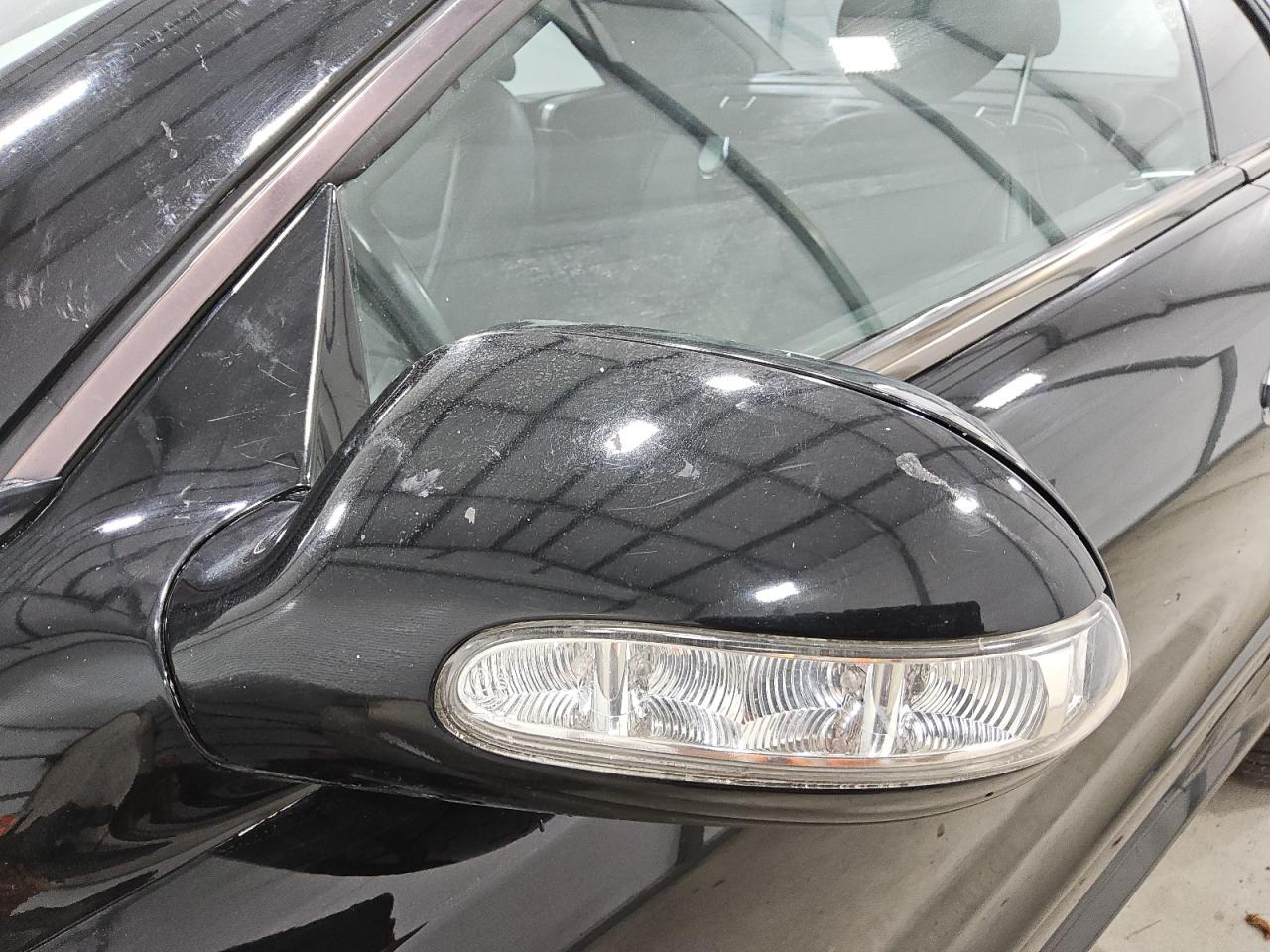 2003 Mercedes-benz Sl 500r Black vin: WDBSK75F03F007670 Damage: Lf Mirror Cover, Heavy Scratch, > 12 Inches