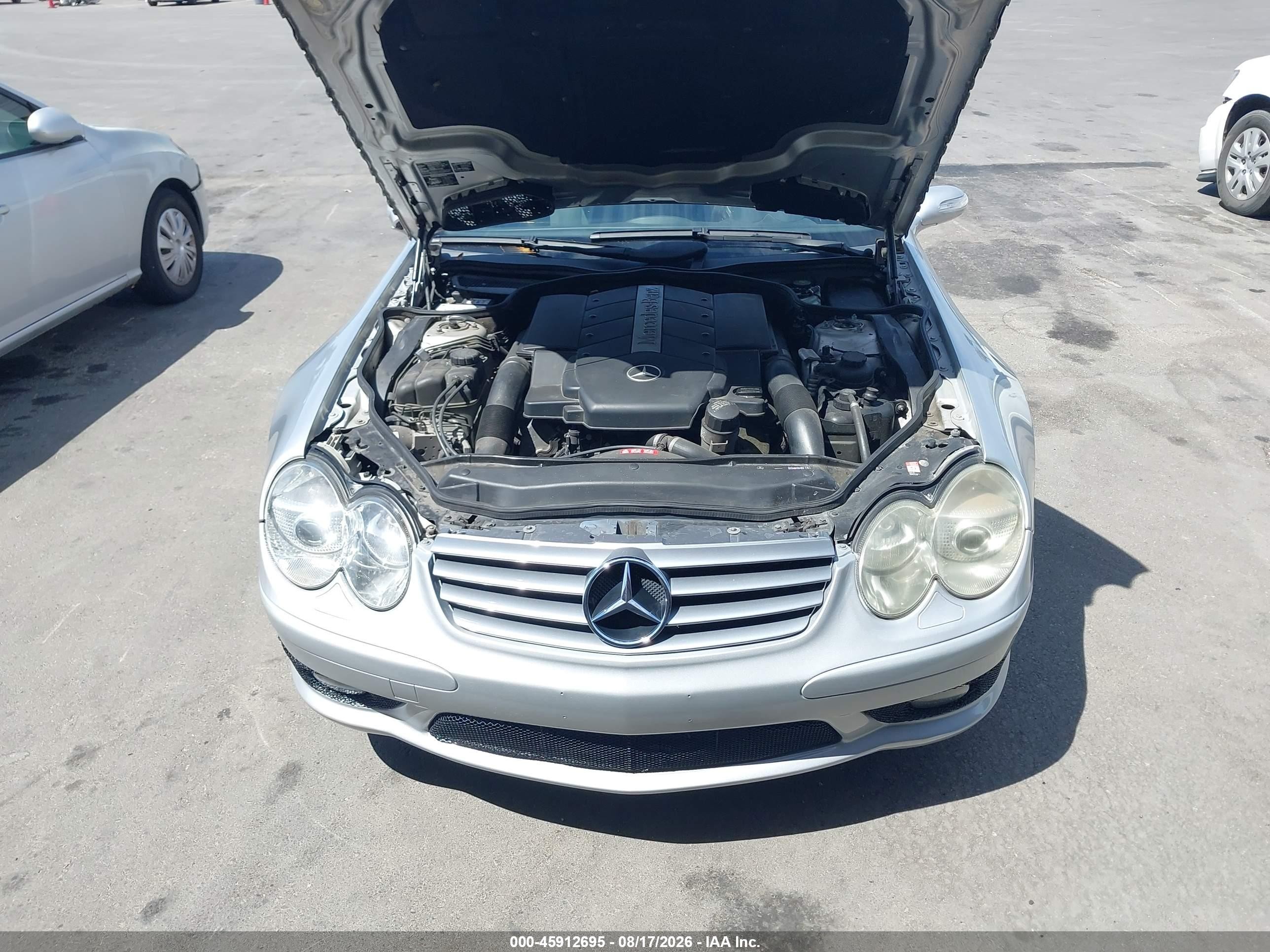 2005 Mercedes-benz Sl 500   Серебряный vin: WDBSK75F45F087350