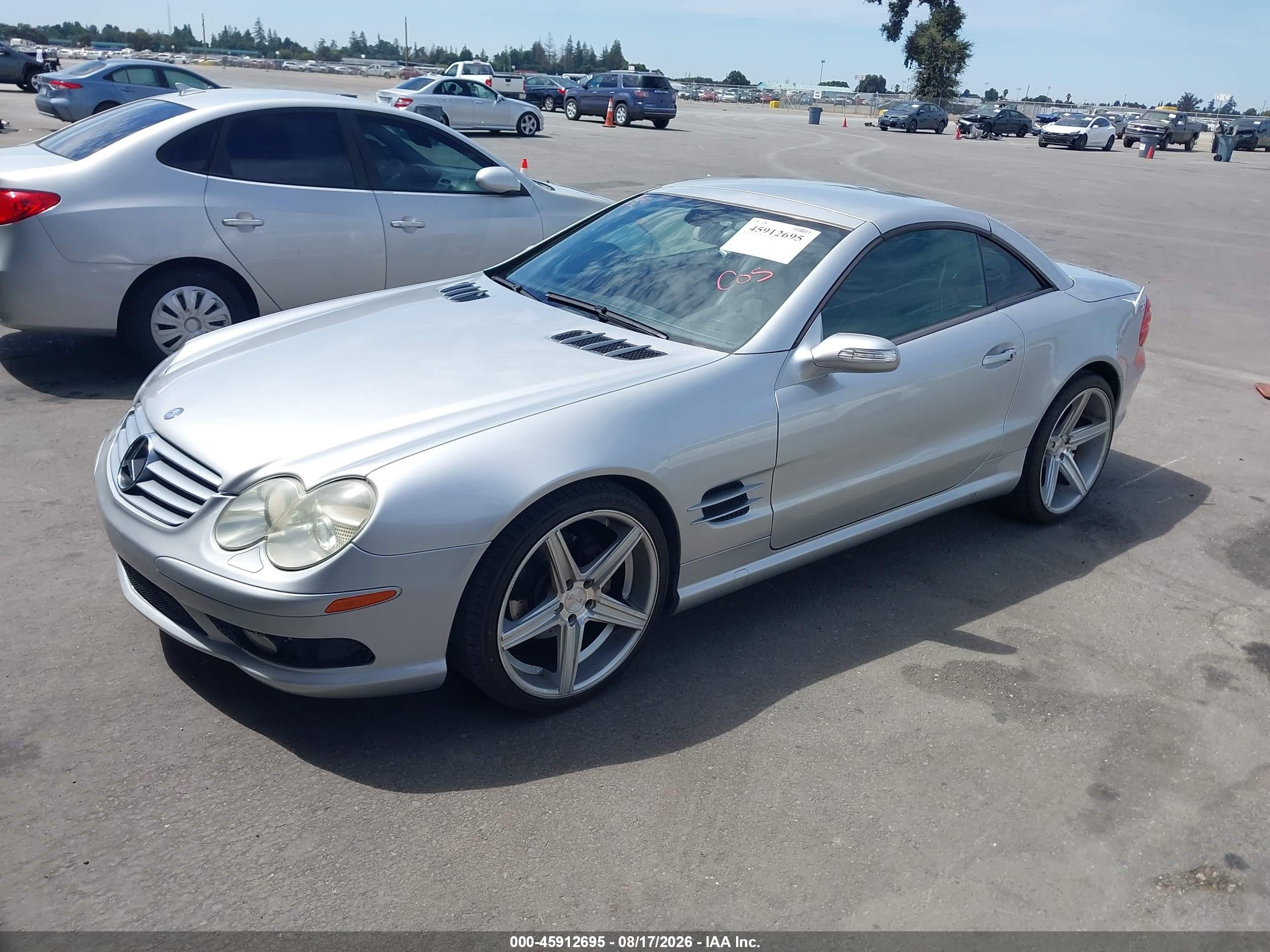 2005 Mercedes-benz Sl 500   Серебряный vin: WDBSK75F45F087350