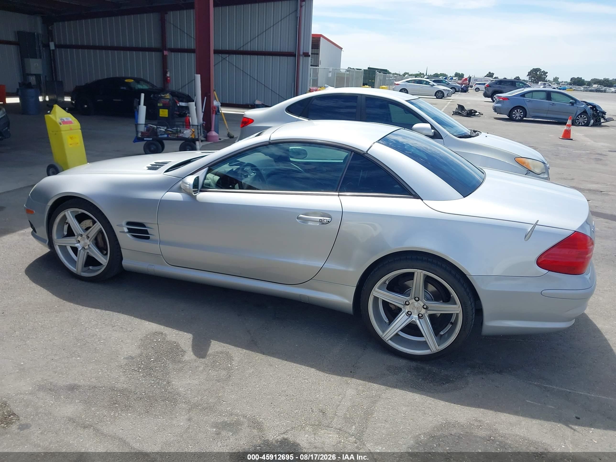 2005 Mercedes-benz Sl 500   Серебряный vin: WDBSK75F45F087350