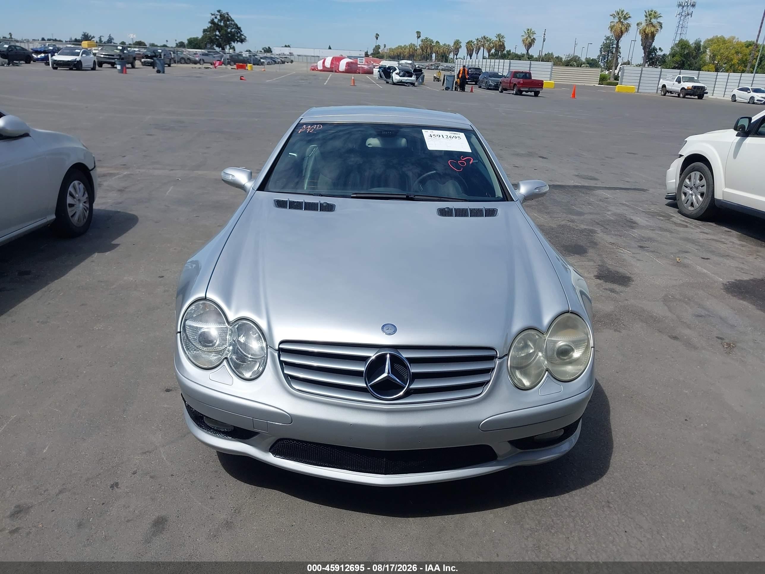 2005 Mercedes-benz Sl 500   Серебряный vin: WDBSK75F45F087350