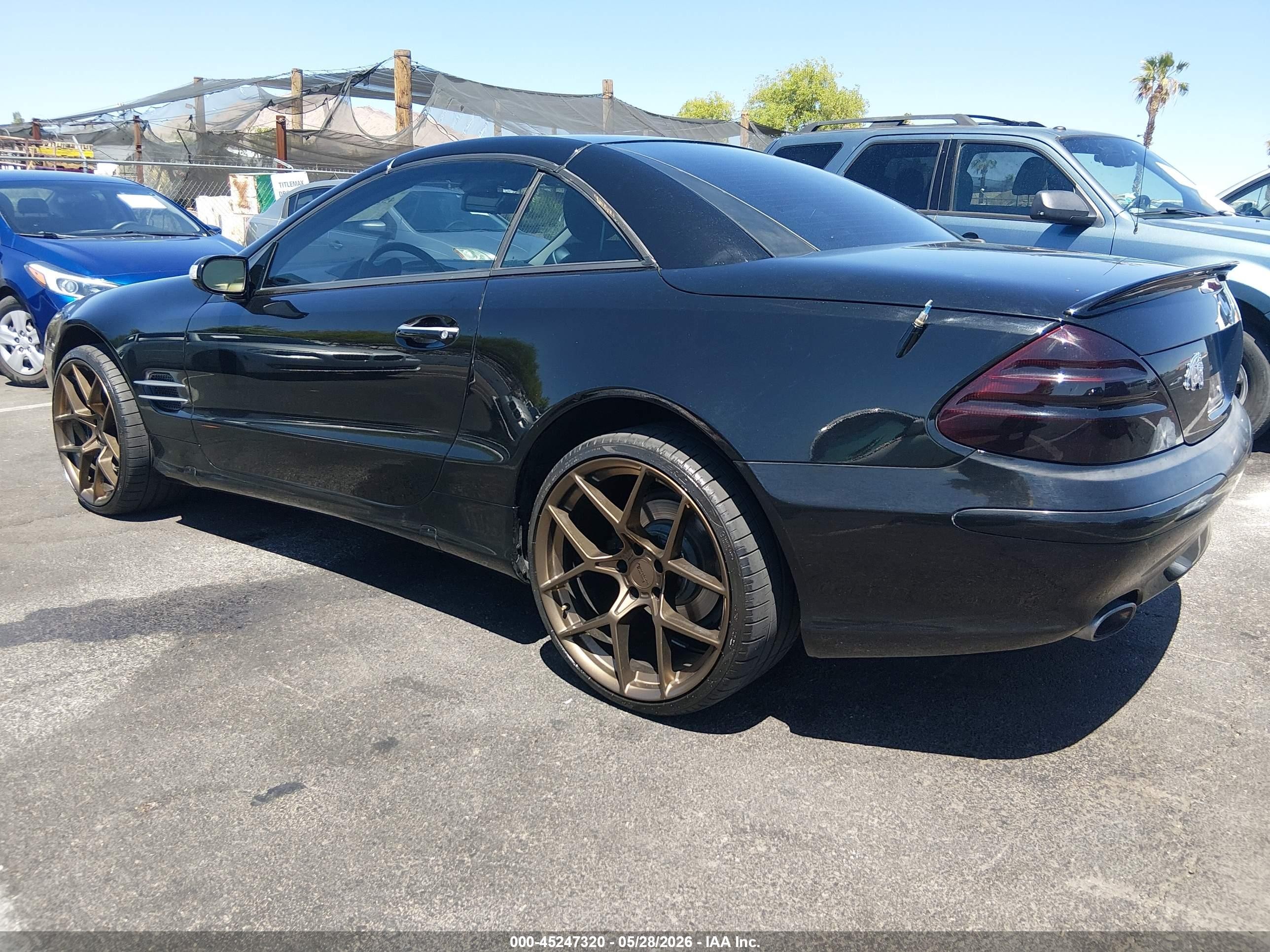 2004 Mercedes-benz Sl 500   Черный vin: WDBSK75F64F072461