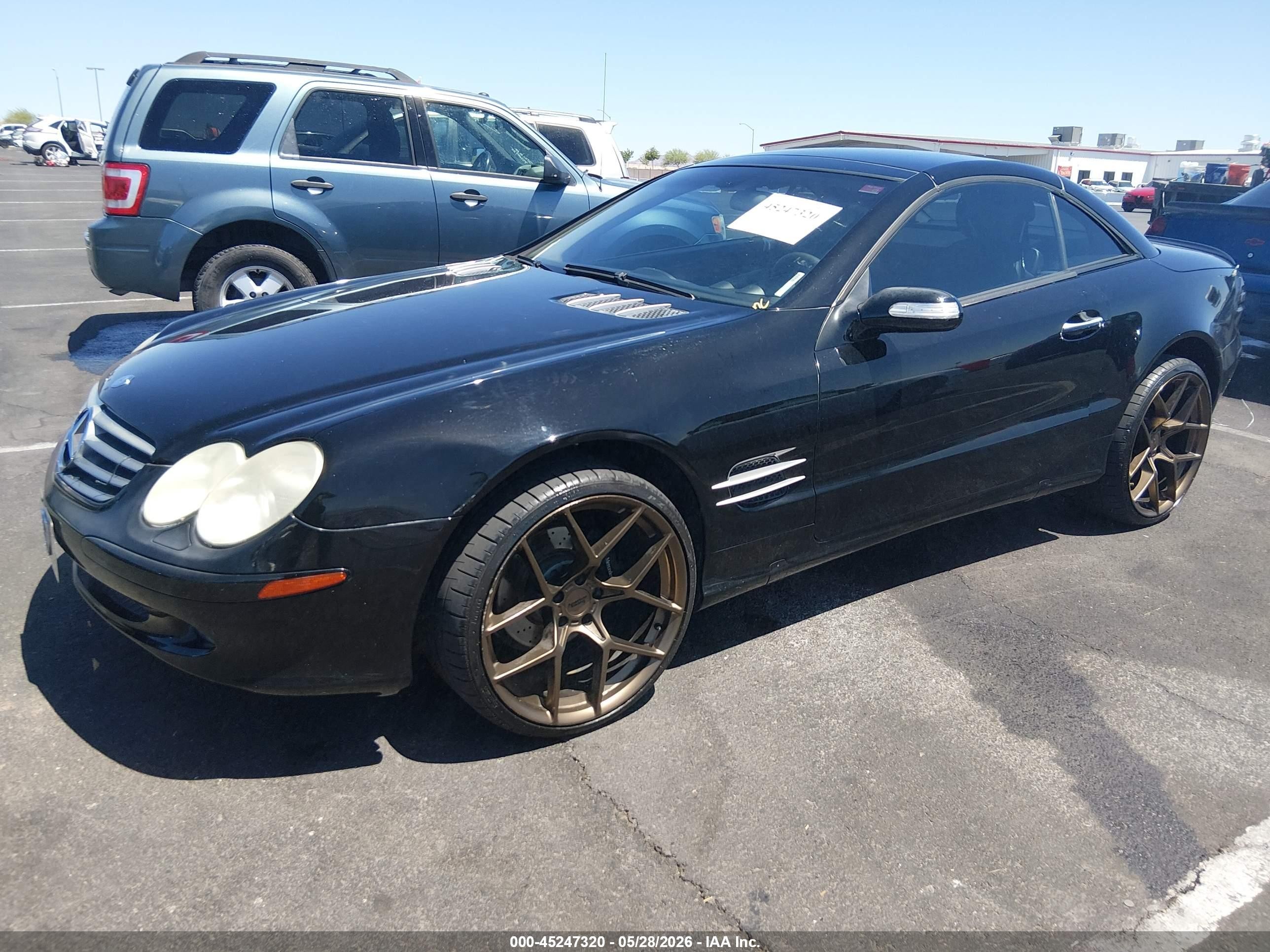 2004 Mercedes-benz Sl 500   Черный vin: WDBSK75F64F072461