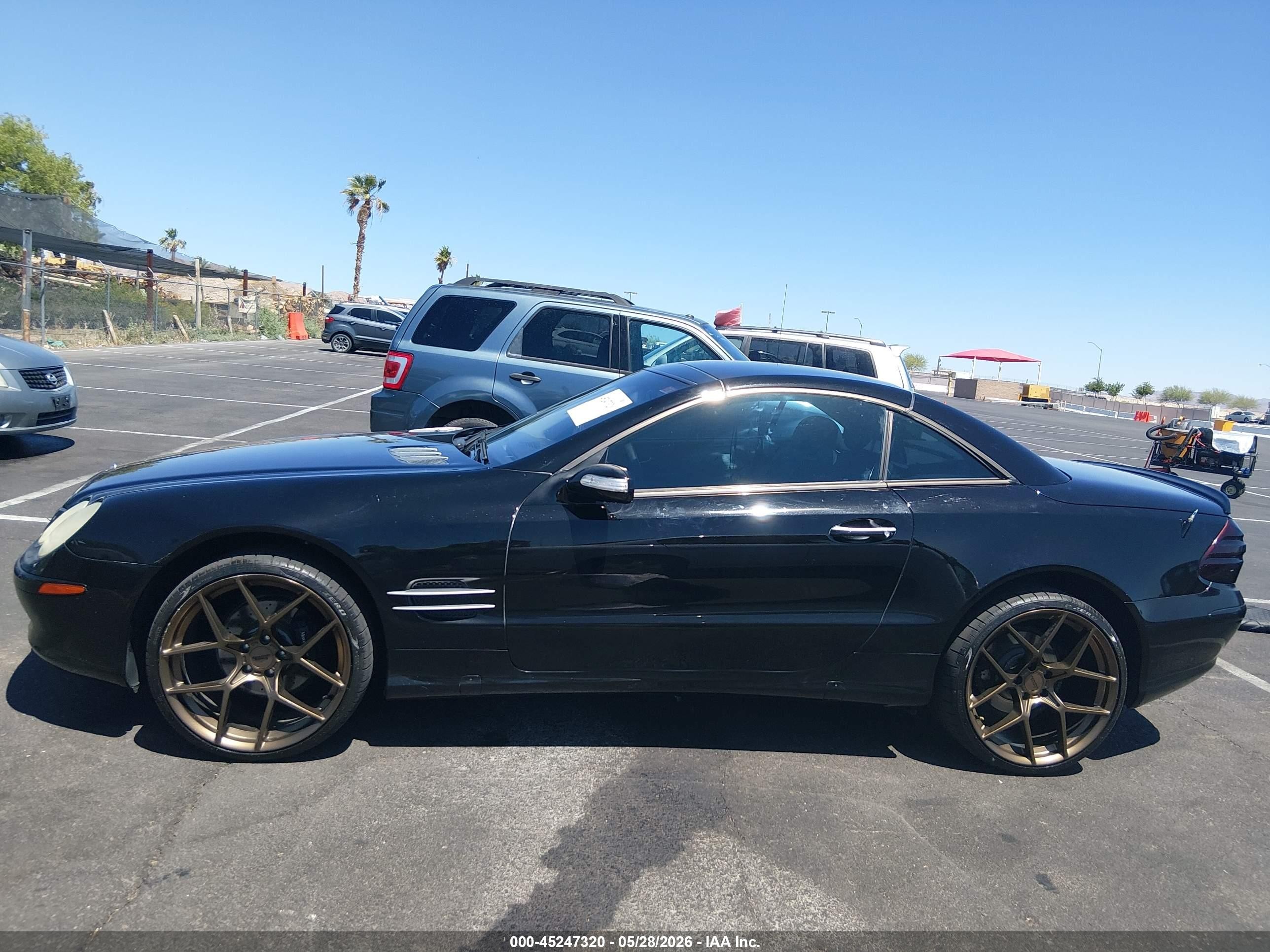 2004 Mercedes-benz Sl 500   Черный vin: WDBSK75F64F072461