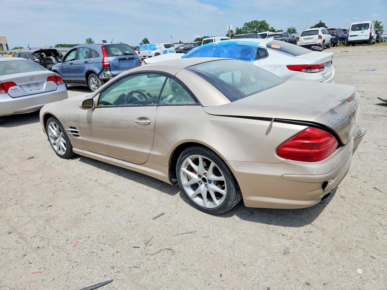 2004 Mercedes-benz Sl 500 Gold vin: WDBSK75F94F069361