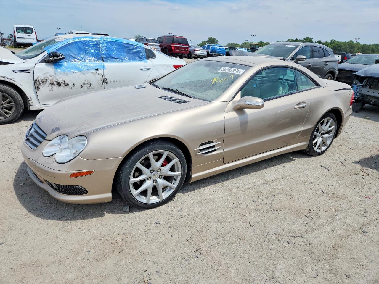 2004 Mercedes-benz Sl 500 Gold vin: WDBSK75F94F069361