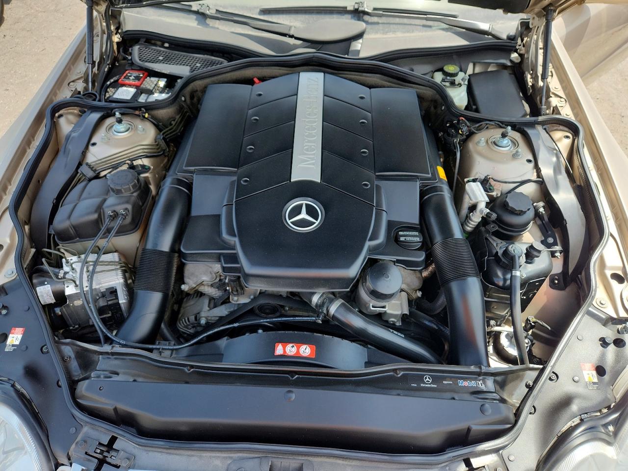 2004 Mercedes-benz Sl 500 Gold vin: WDBSK75F94F069361