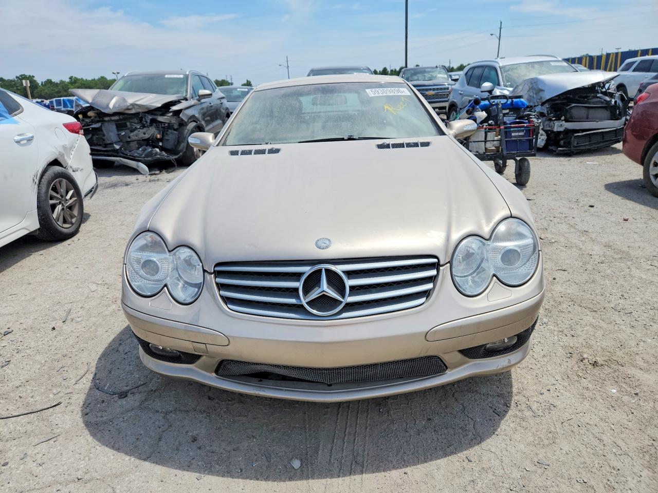2004 Mercedes-benz Sl 500 Gold vin: WDBSK75F94F069361