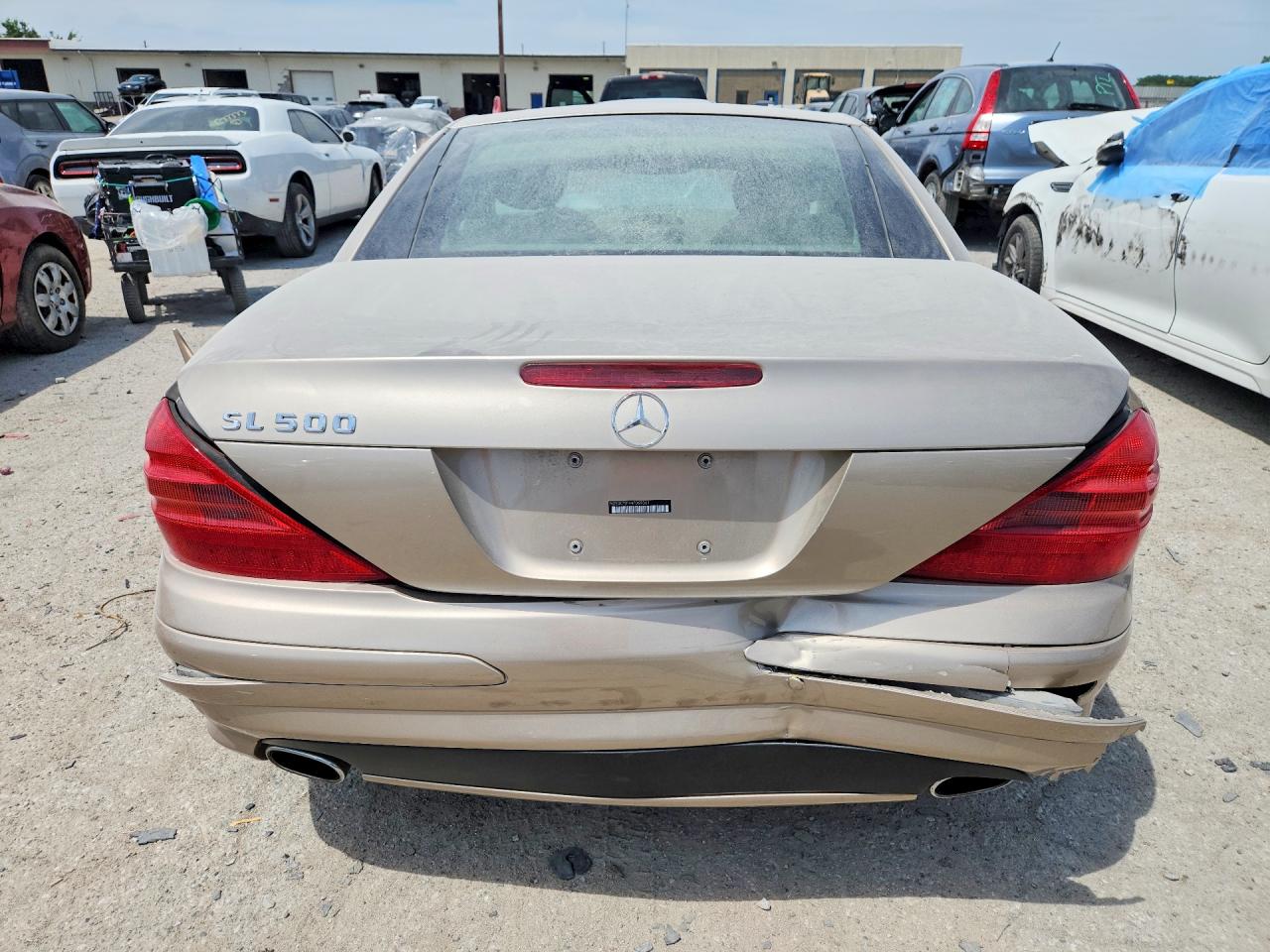 2004 Mercedes-benz Sl 500 Gold vin: WDBSK75F94F069361