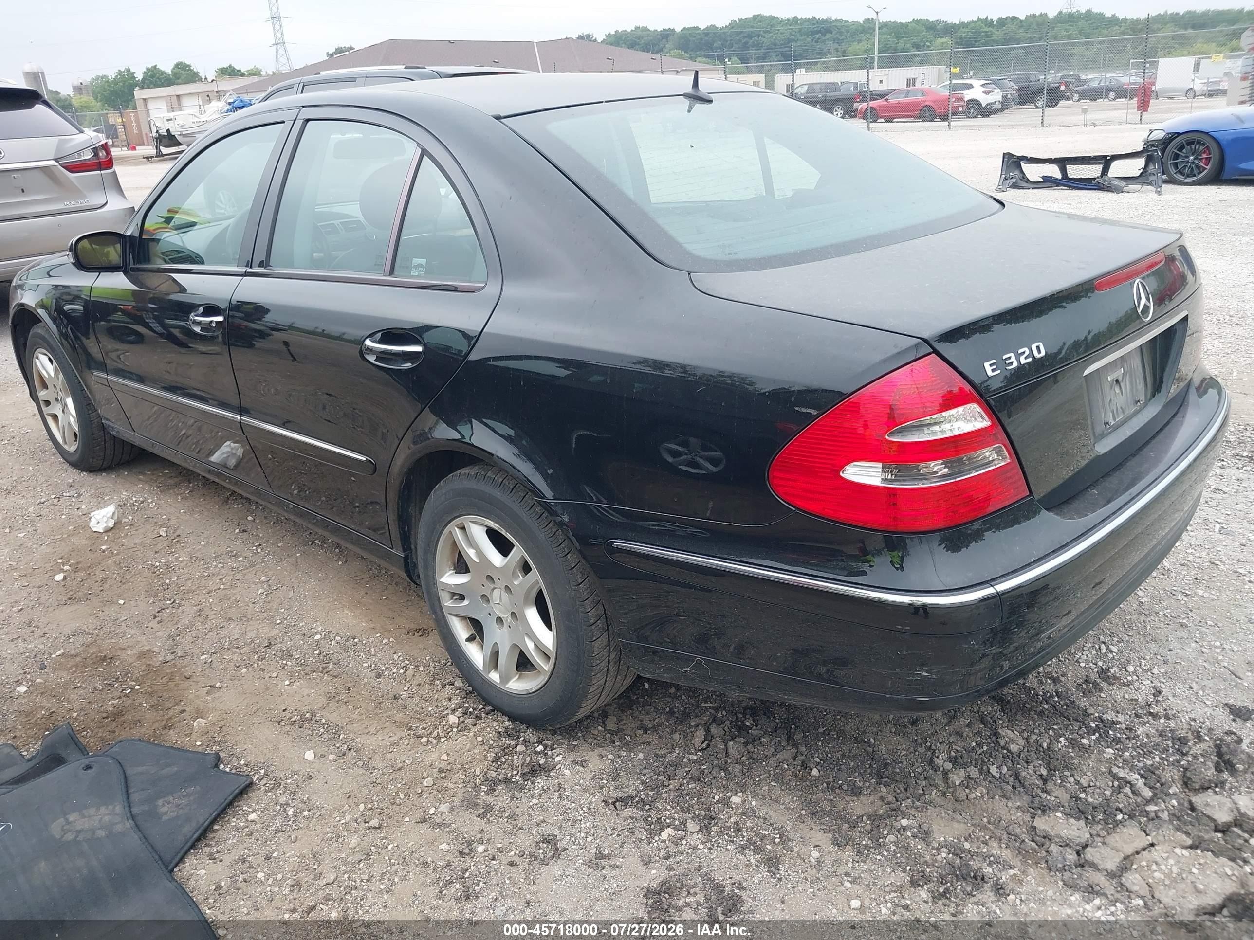 2004 Mercedes-benz E 320   Black vin: WDBUF65J14A394546