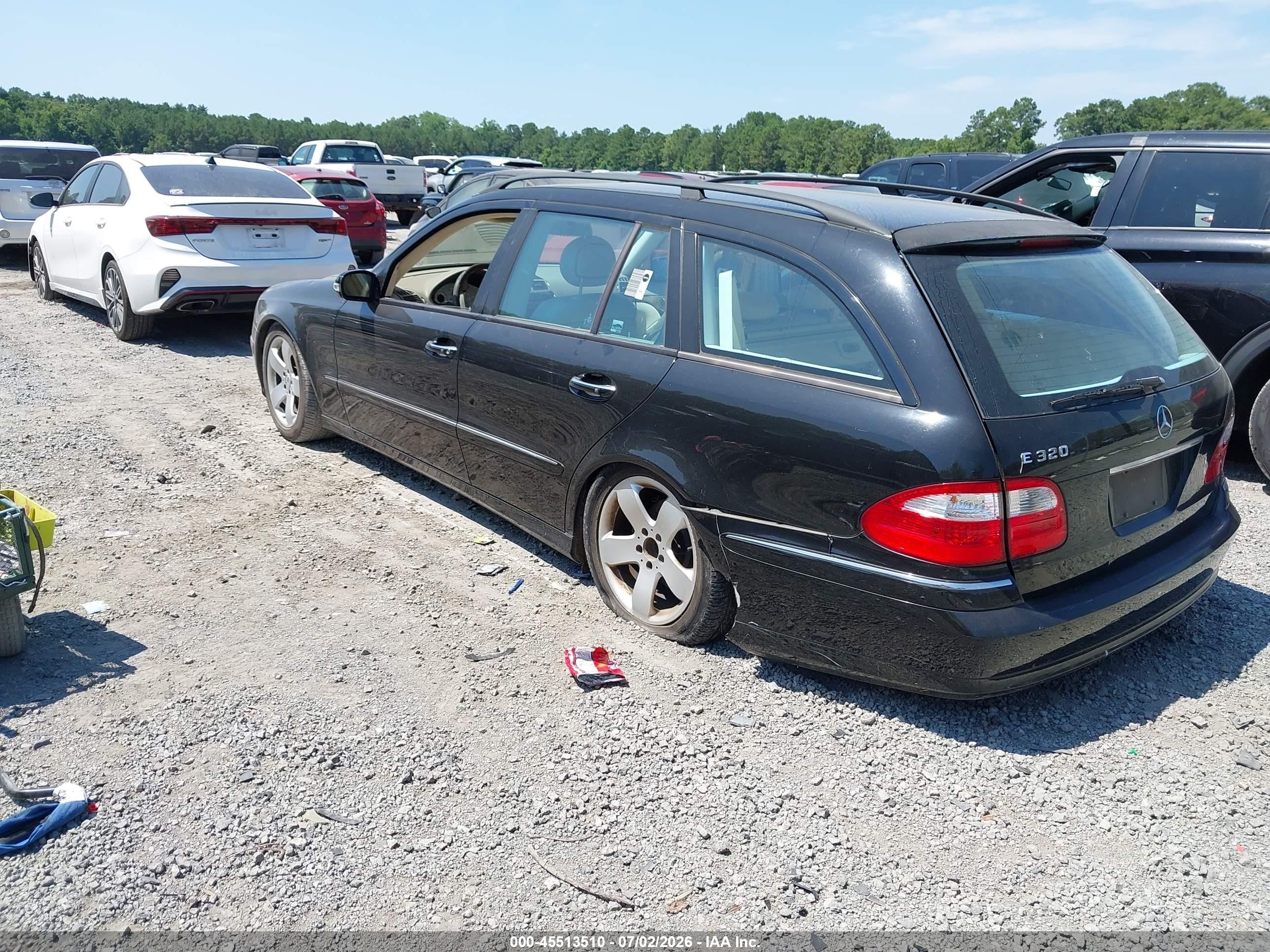 2004 Mercedes-benz E 320   Black vin: WDBUH65J24A475257