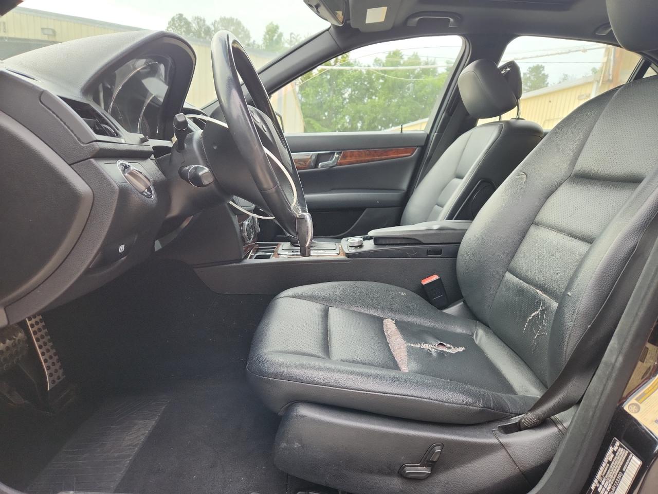 2010 Mercedes-benz C 300 Black vin: WDDGF5EB6AR123390 Damage: Left Front Seat, Torn, > 12 Inches