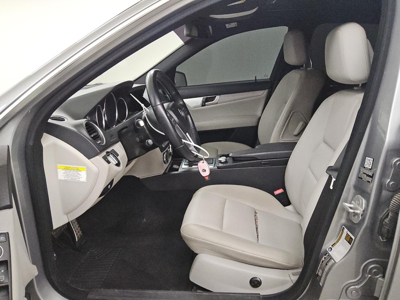 2014 Mercedes-benz C 300 4matic Silver vin: WDDGF8AB4EA892594 Damage: Left Front Seat Cushion, Torn, > 12 Inches