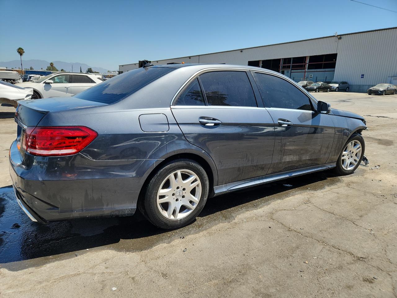 2014 Mercedes-benz E 350 Blue vin: WDDHF5KB9EA778933 Damage: Right Qtr Panel, Dent(S) W/No Paint Dmg, 2 To 3 Inches