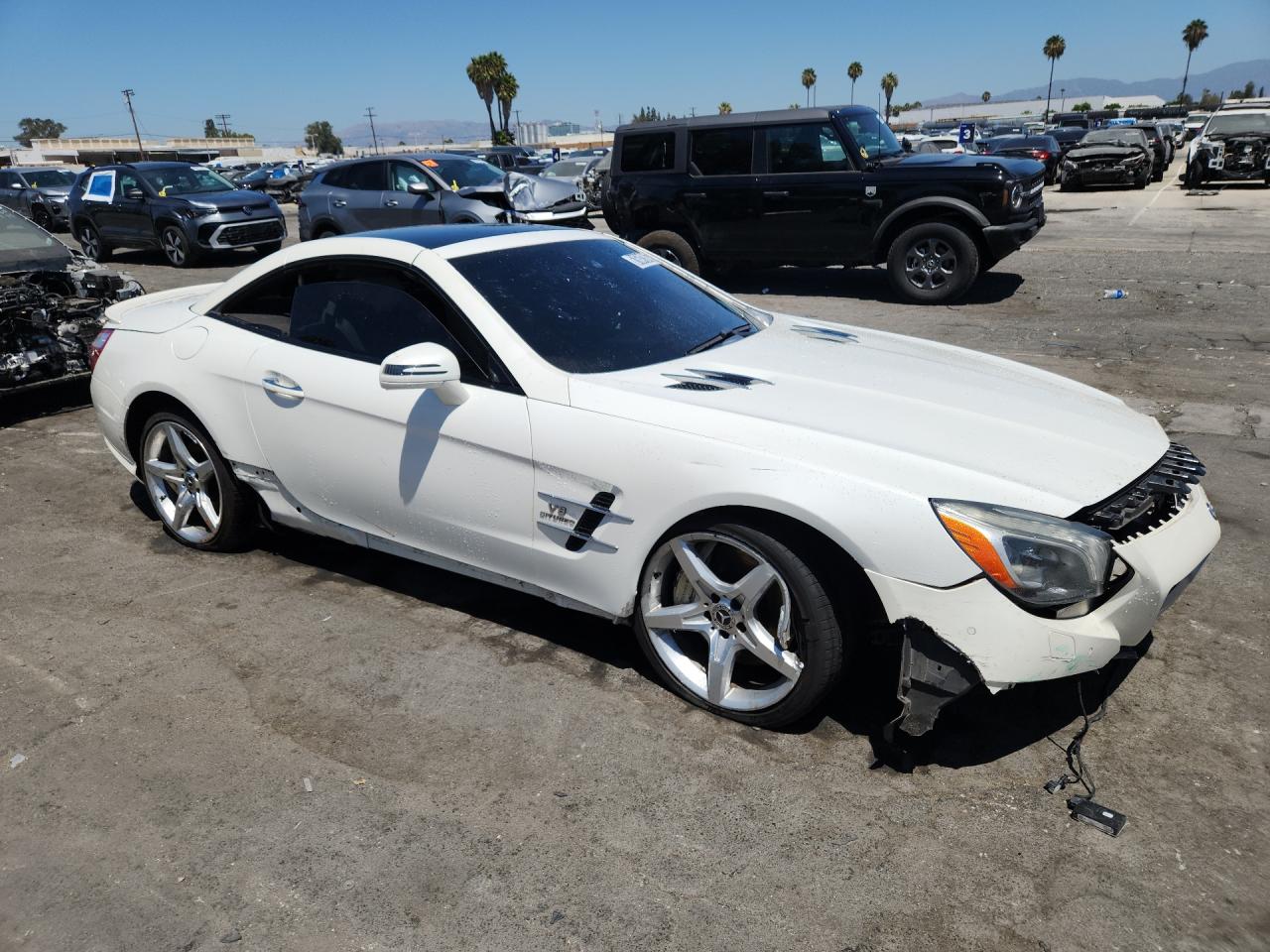 2013 Mercedes-benz Sl 550 White vin: WDDJK7DA1DF014010 Damage: Right Front Wheel, Broken, Replacement Required