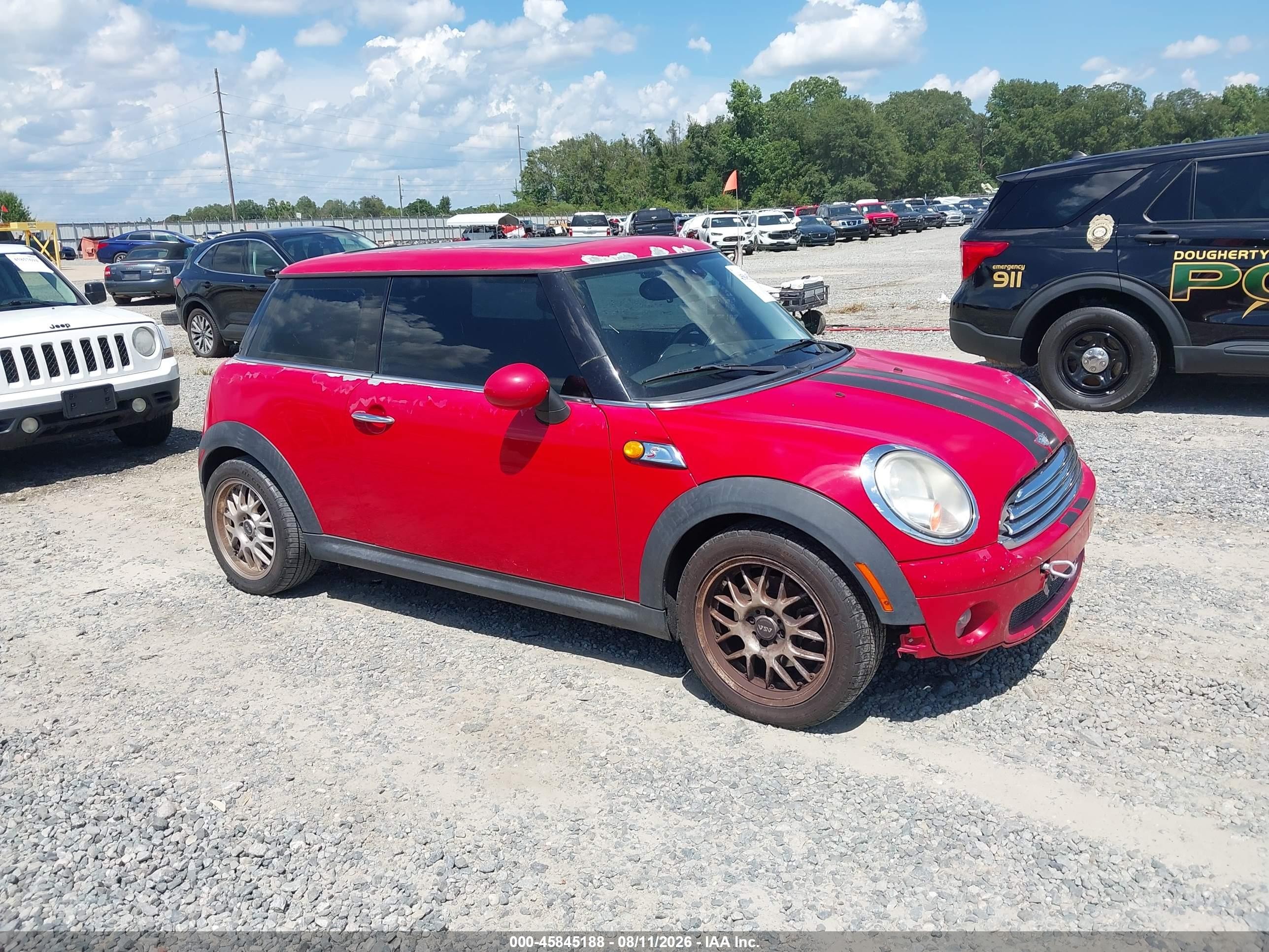 2009 Mini Cooper   Red vin: WMWMF33509TT69698