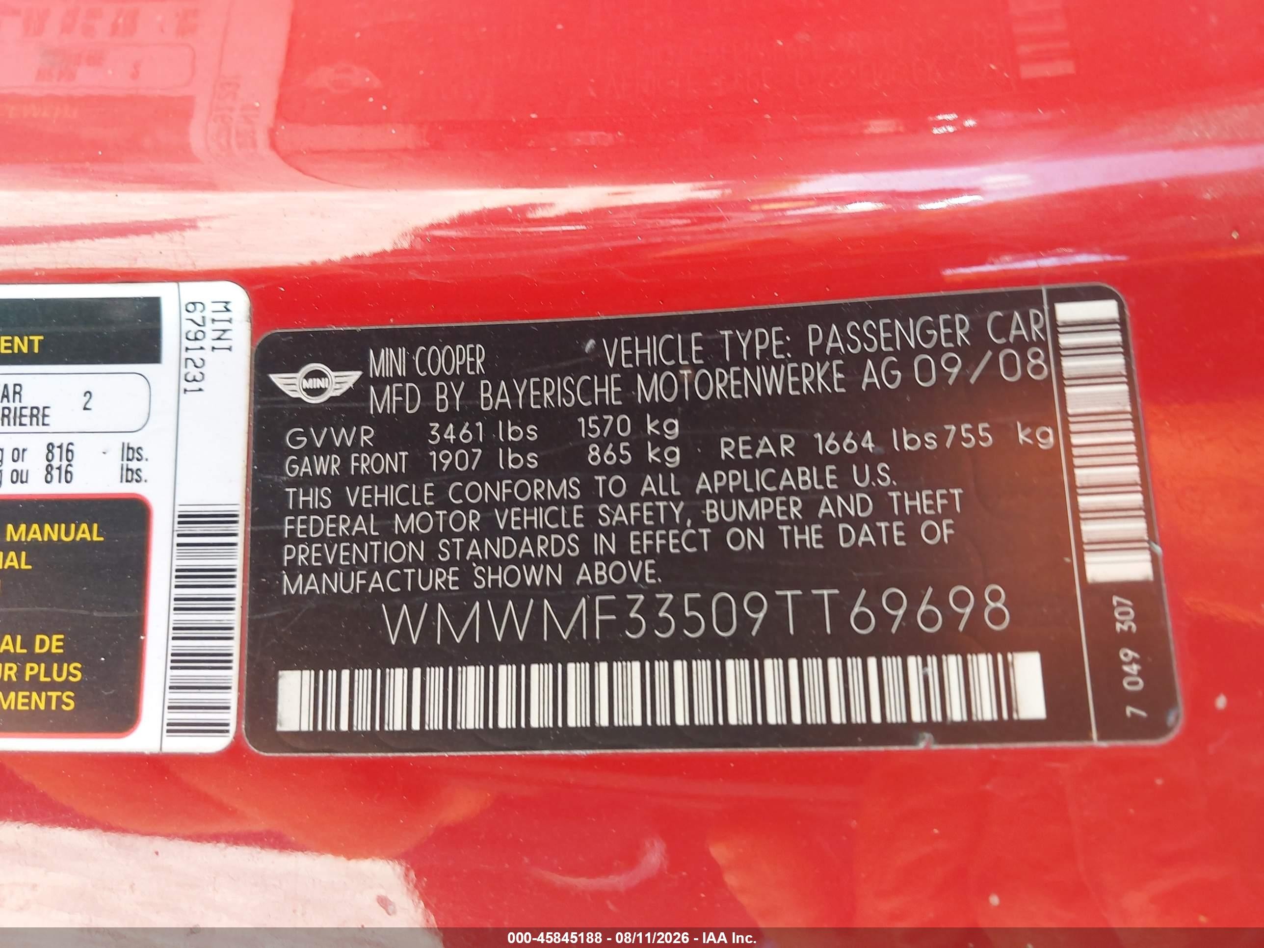 2009 Mini Cooper   Red vin: WMWMF33509TT69698