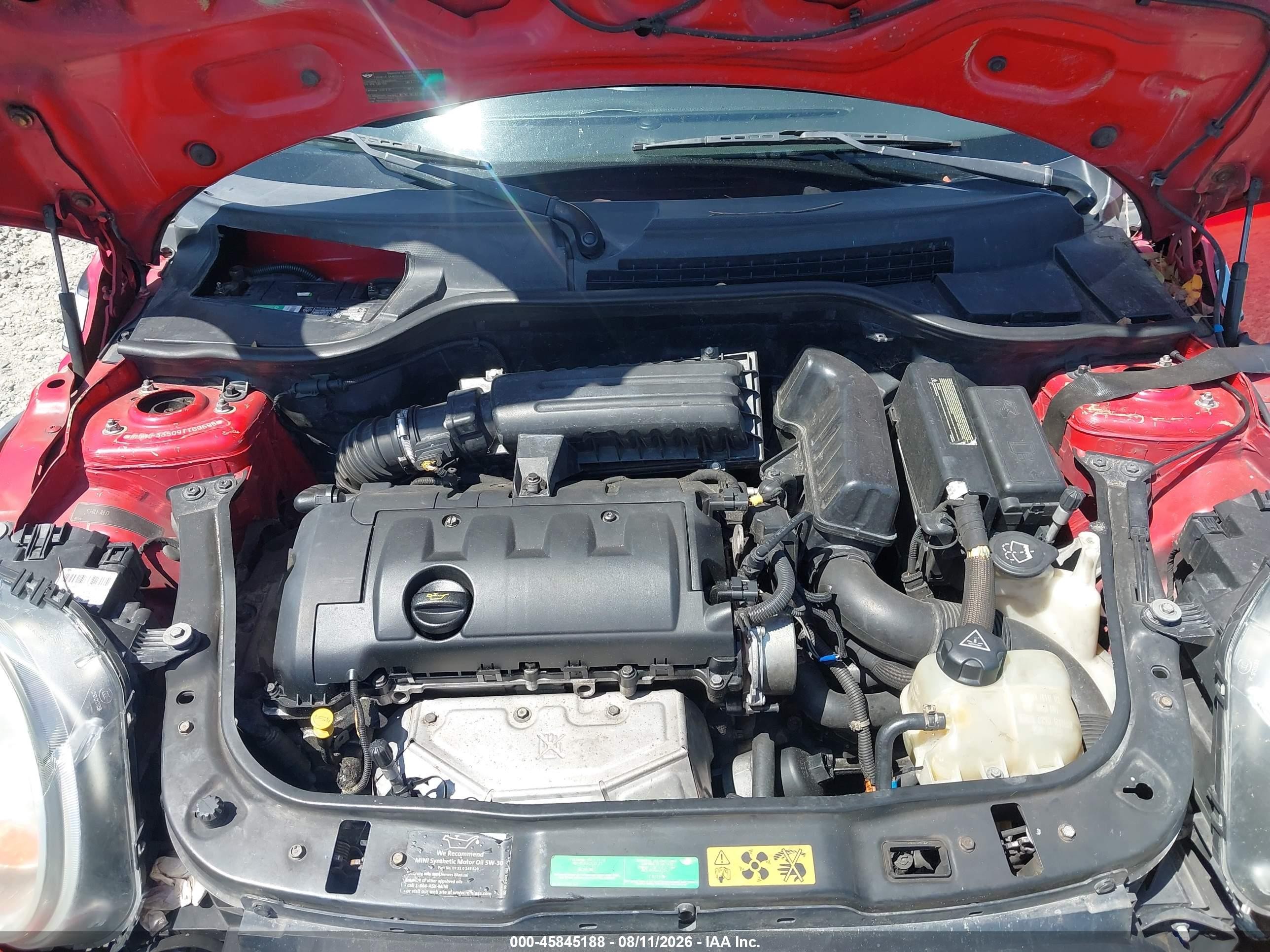 2009 Mini Cooper   Red vin: WMWMF33509TT69698