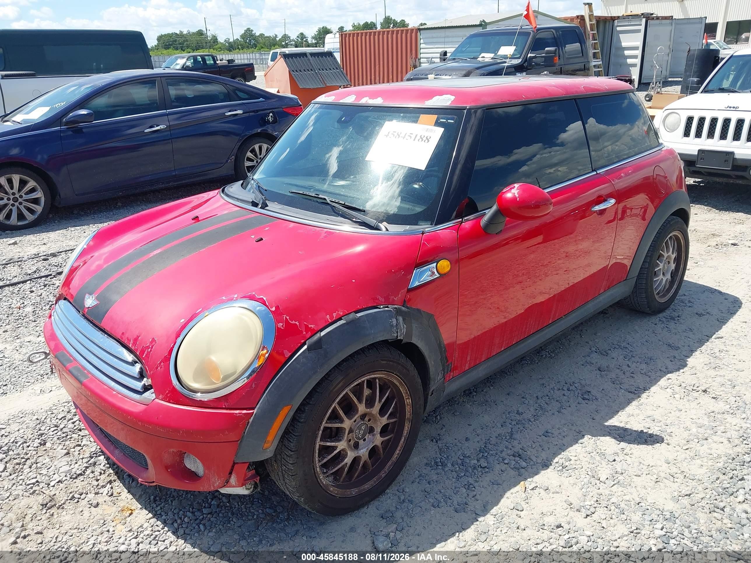 2009 Mini Cooper   Red vin: WMWMF33509TT69698