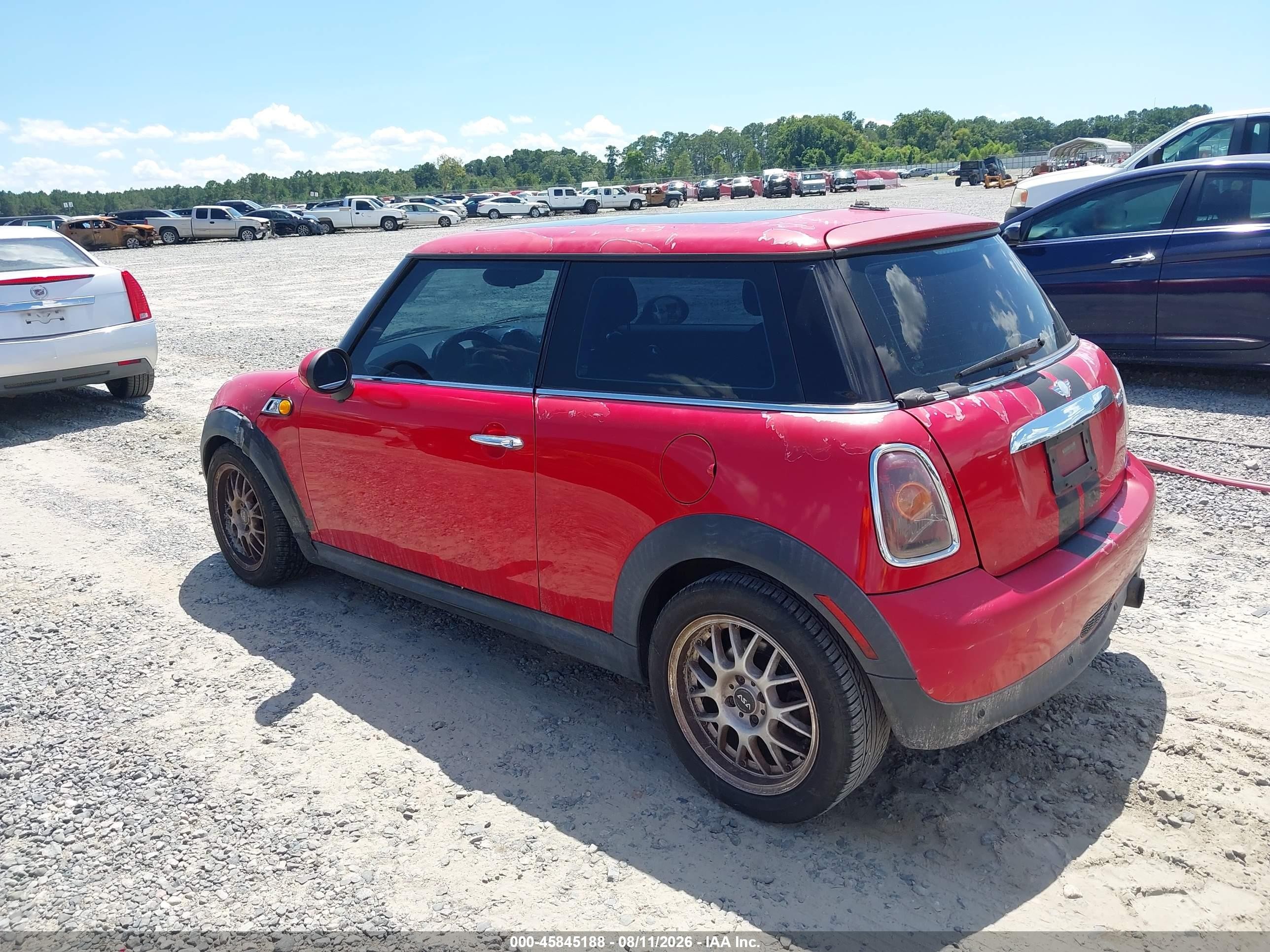 2009 Mini Cooper   Red vin: WMWMF33509TT69698