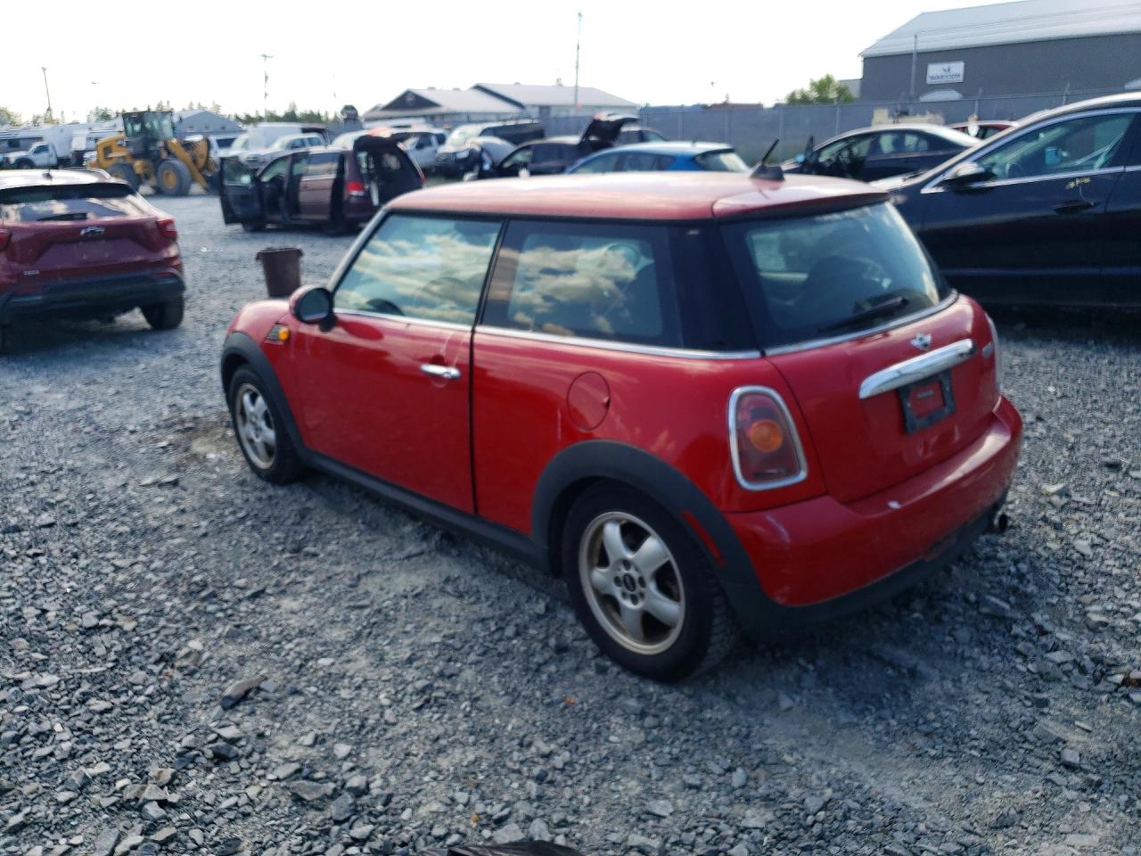 2009 Mini Cooper Base Red vin: WMWMF33519TU69941