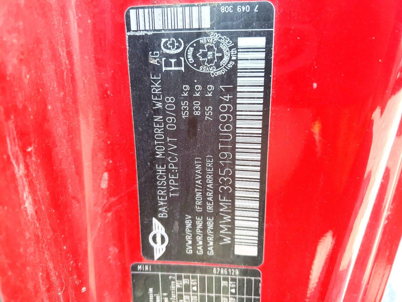 2009 Mini Cooper Base Red vin: WMWMF33519TU69941