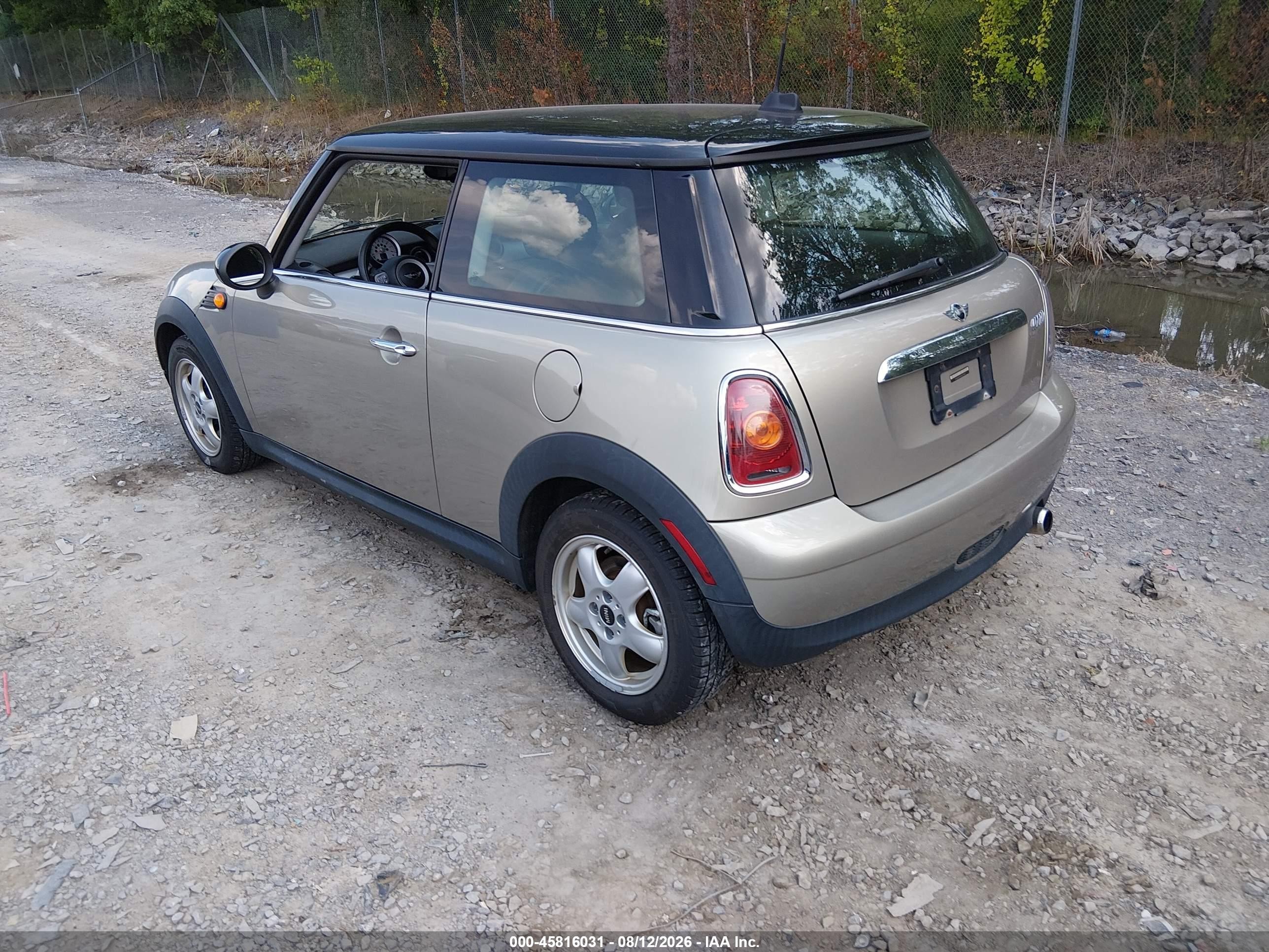 2009 Mini Cooper   Gray vin: WMWMF33519TU75187