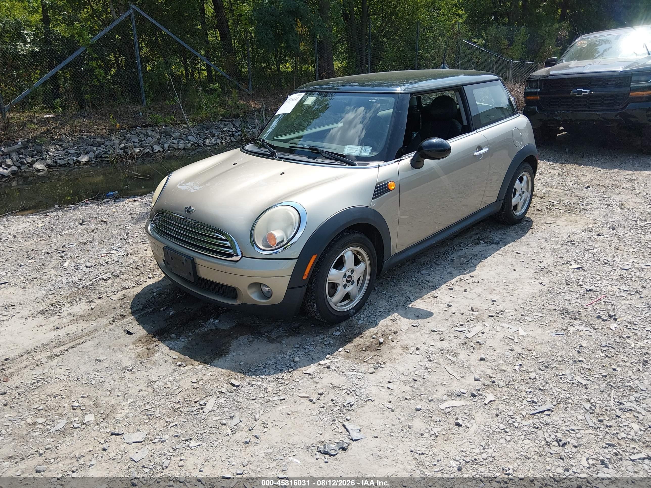 2009 Mini Cooper   Gray vin: WMWMF33519TU75187