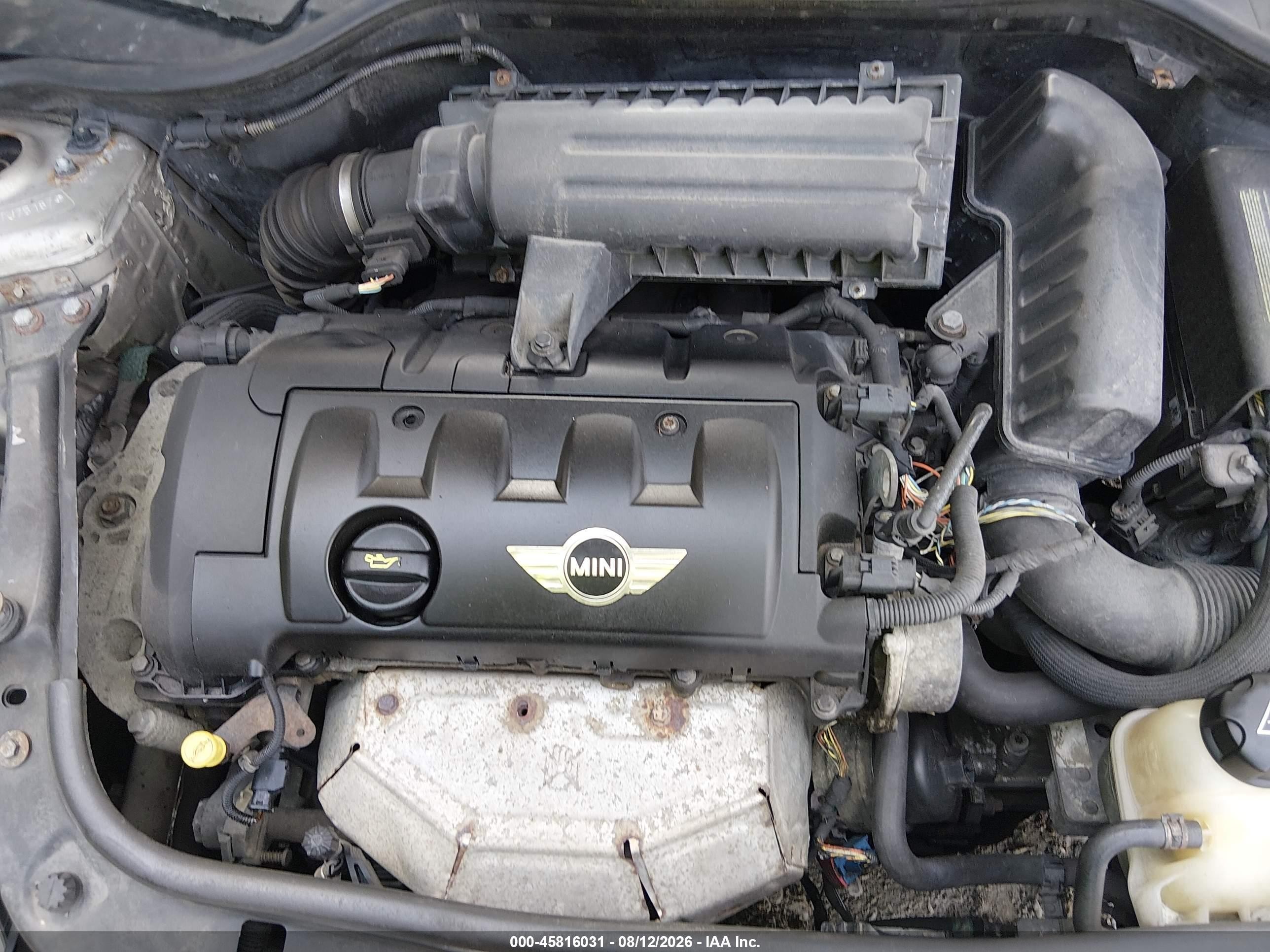 2009 Mini Cooper   Gray vin: WMWMF33519TU75187