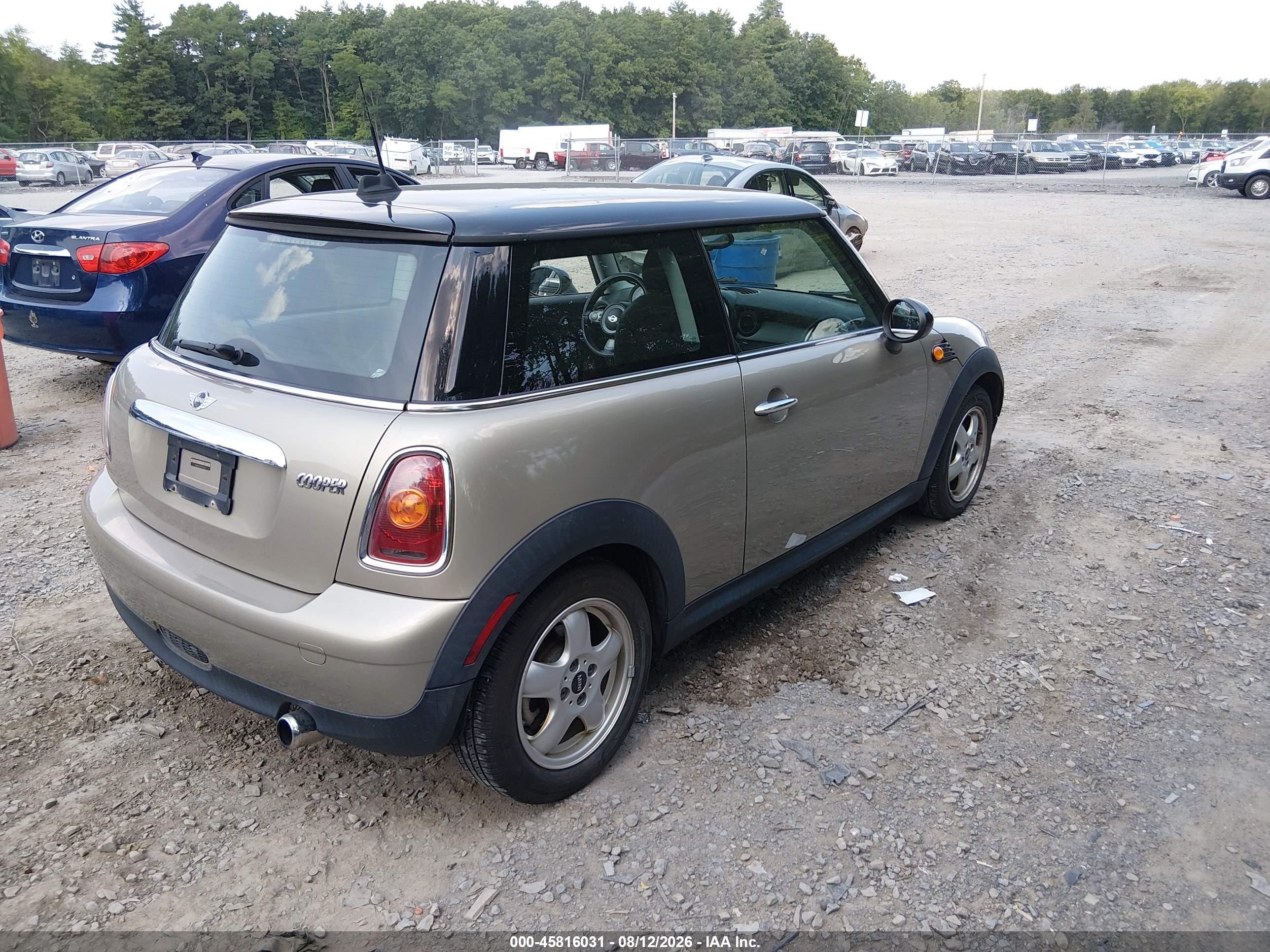 2009 Mini Cooper   Gray vin: WMWMF33519TU75187
