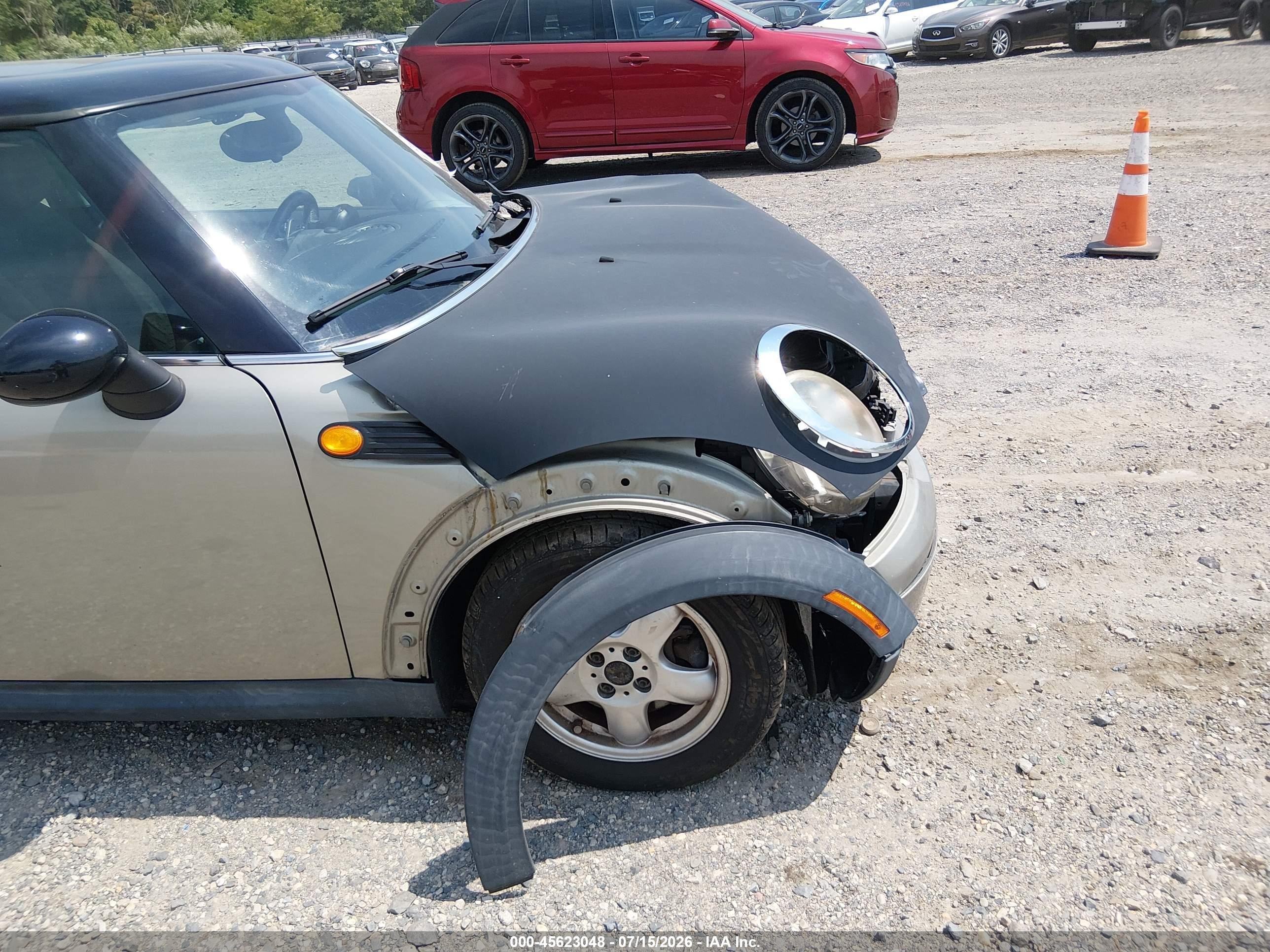 2009 Mini Cooper   Gold vin: WMWMF33529TU71388