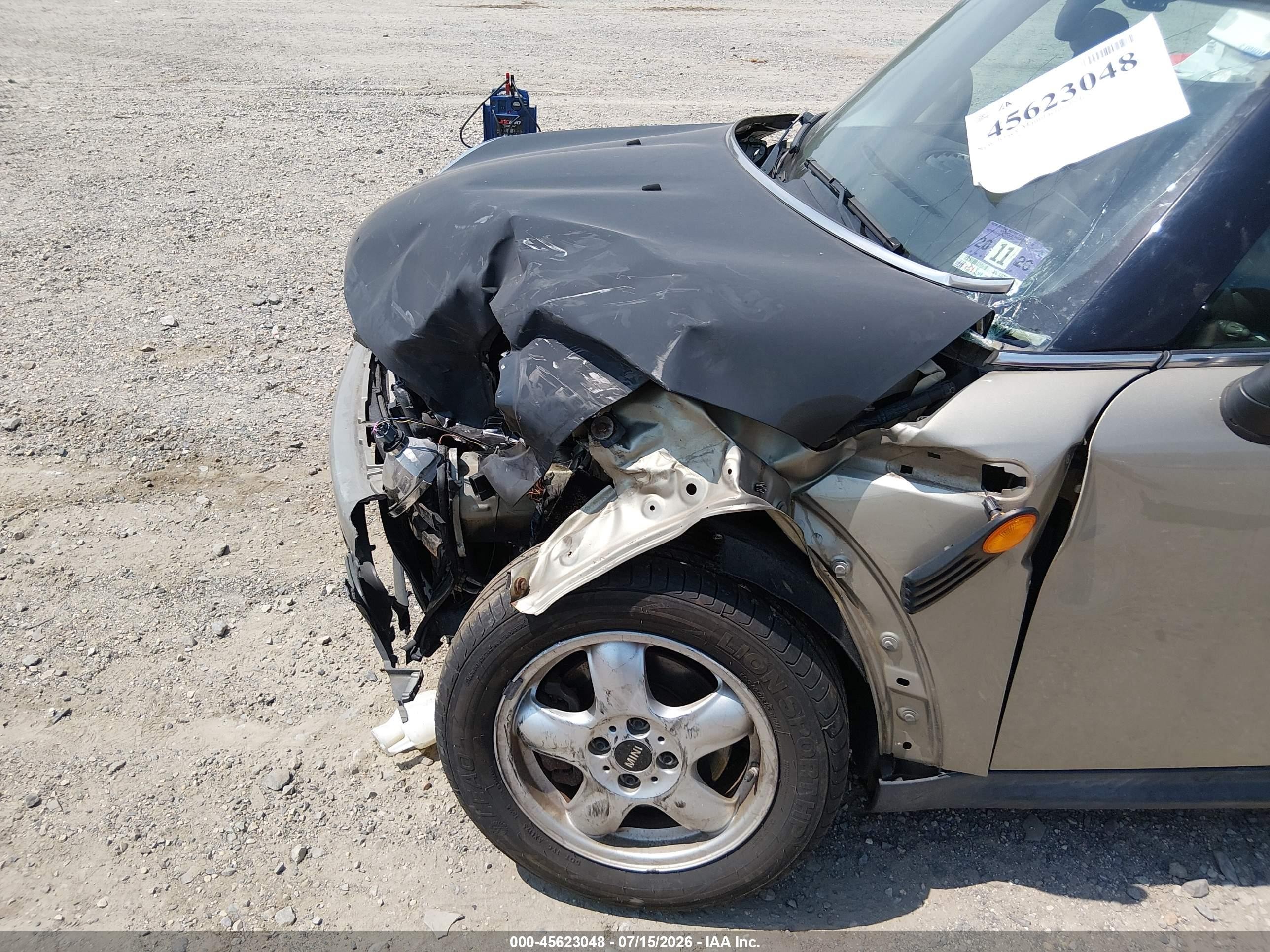 2009 Mini Cooper   Gold vin: WMWMF33529TU71388