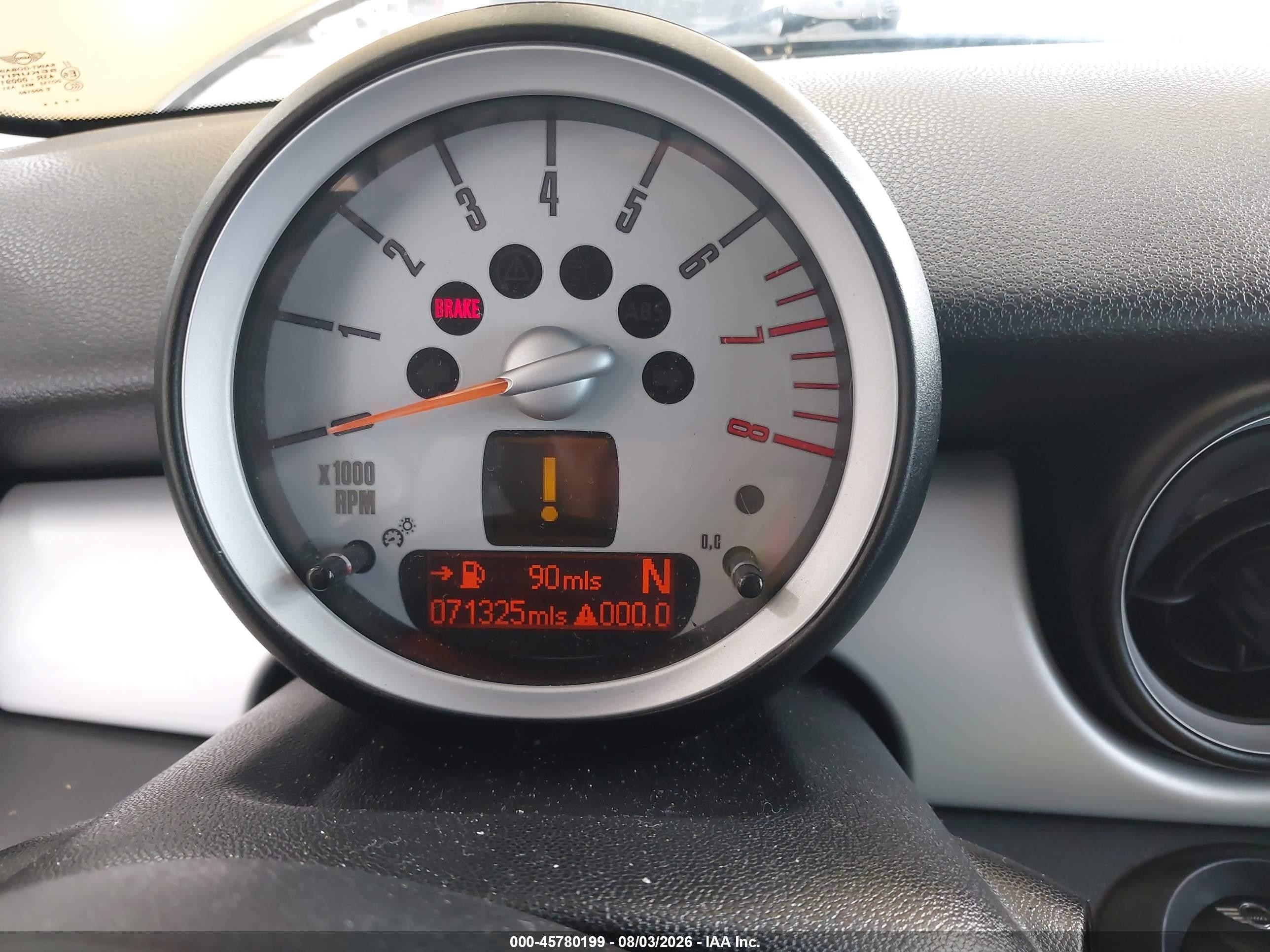 2009 Mini Cooper   Yellow vin: WMWMF33539TW73673