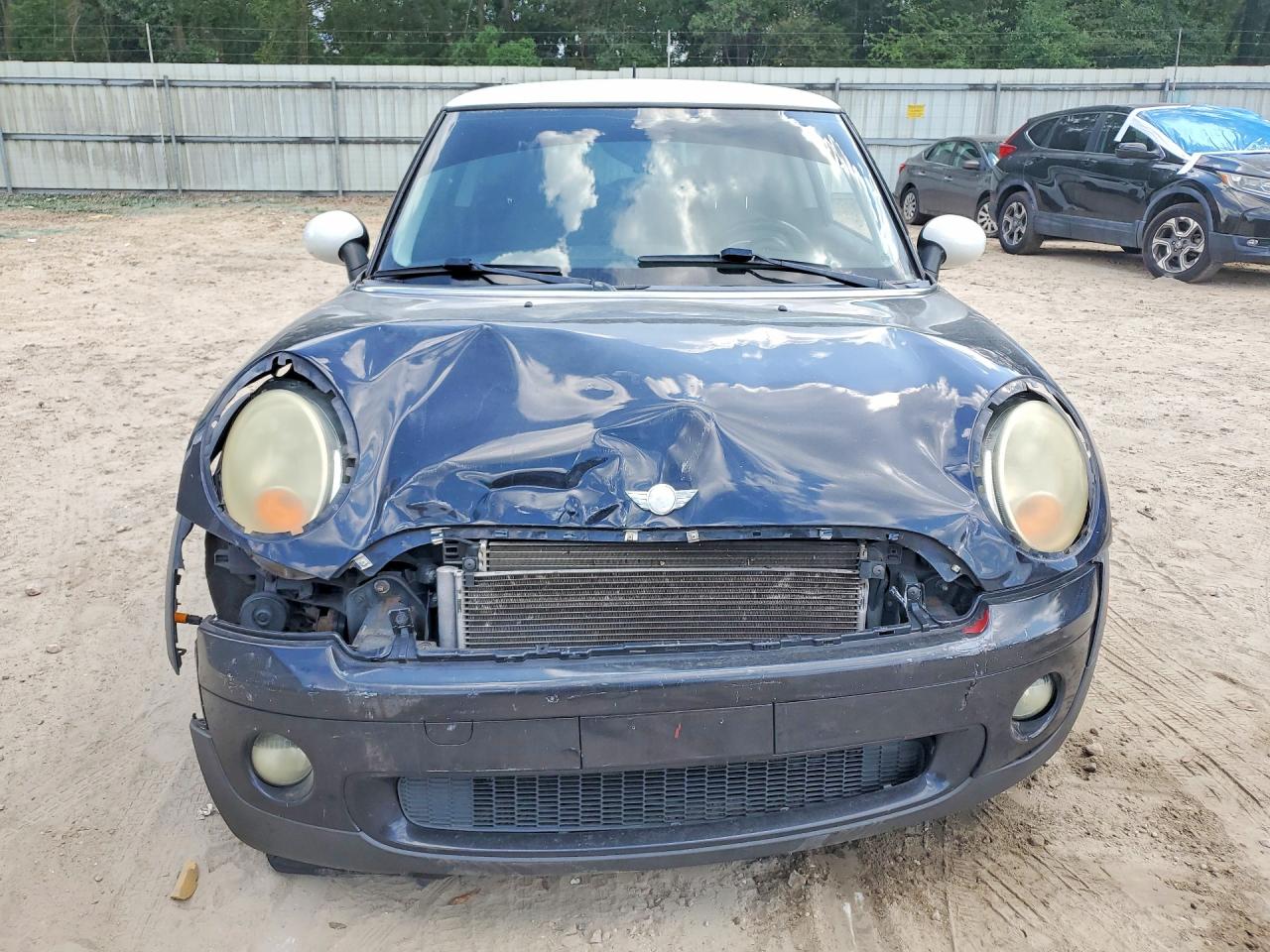 2007 Mini Cooper Black vin: WMWMF33547TU62706