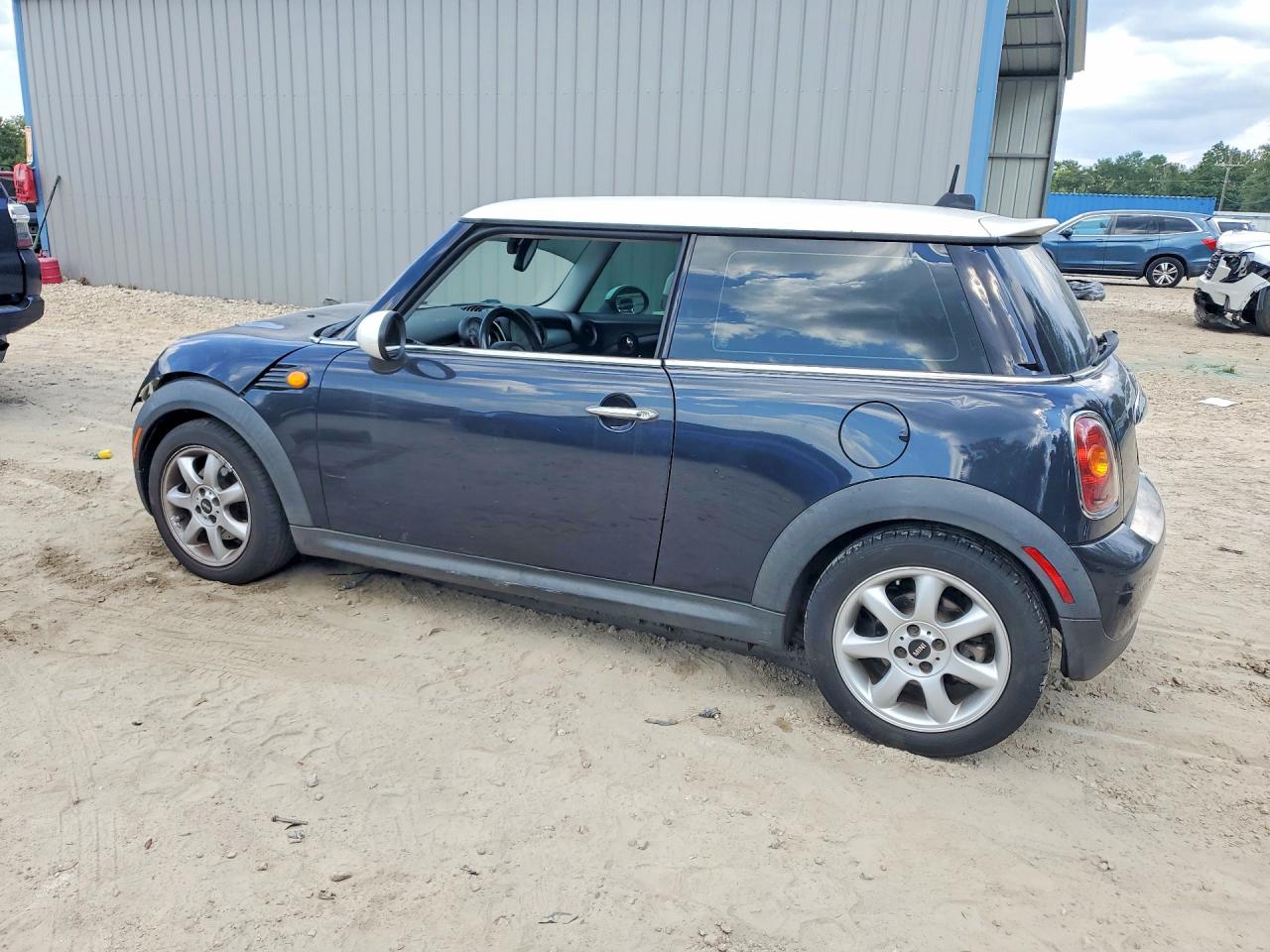 2007 Mini Cooper Black vin: WMWMF33547TU62706